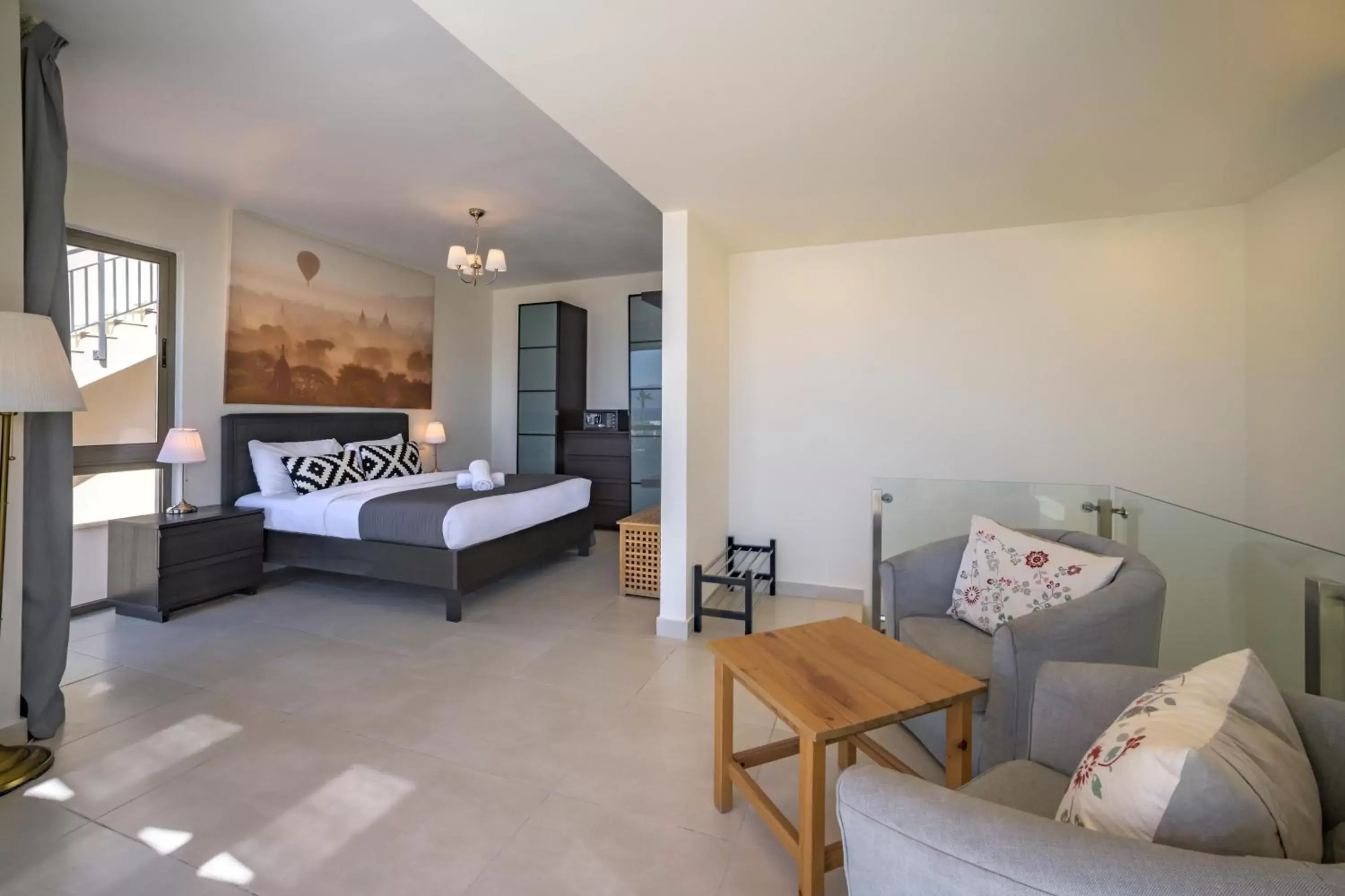 Bed, Seating Area in Tala Bay Residence