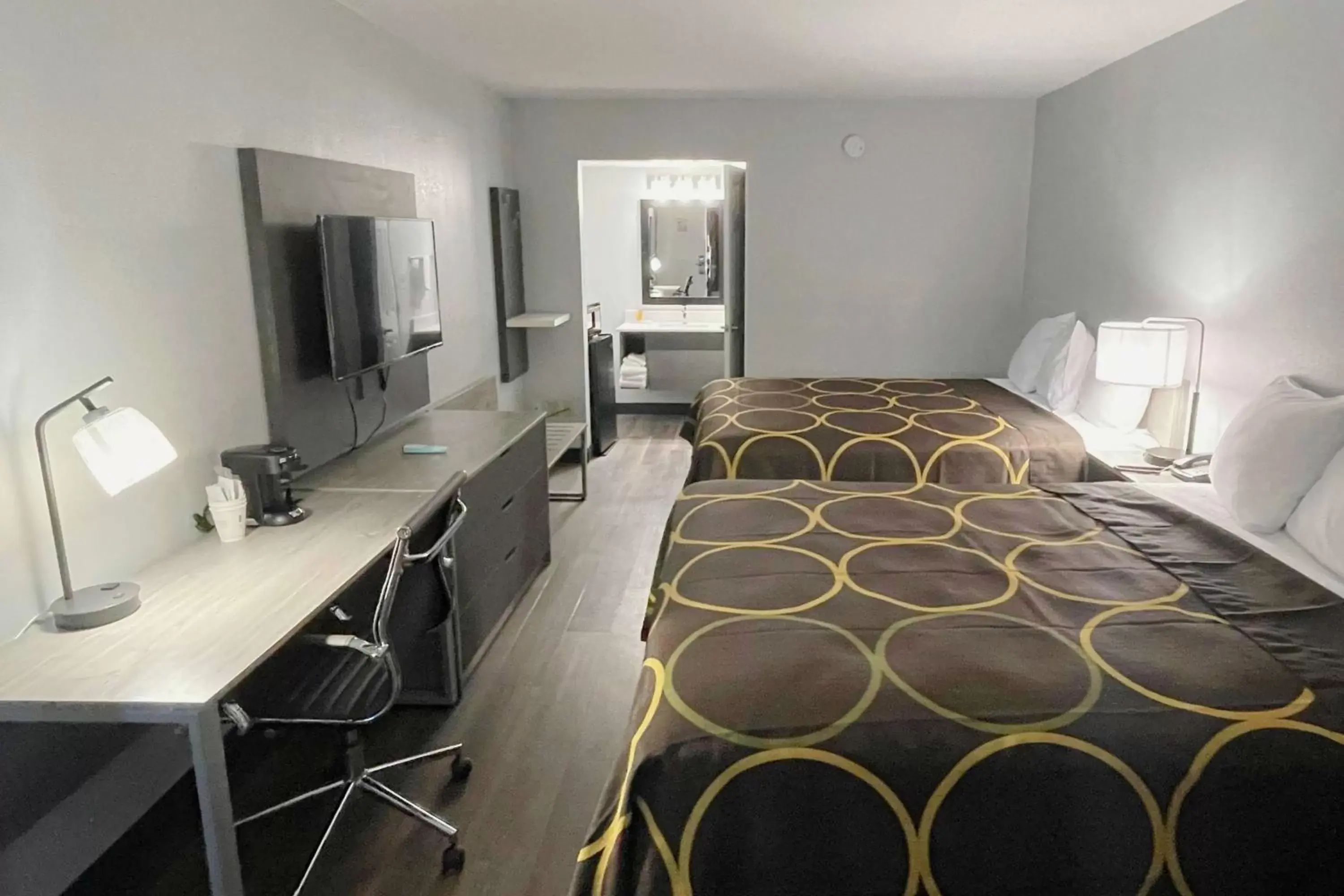 Photo of the whole room, Bed in Super 8 by Wyndham Pigeon Forge Downtown Photo of the whole room, Bed in Super 8 by Wyndham Pigeon Forge Downtown