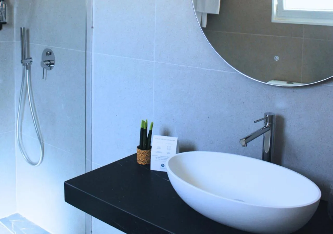 Bathroom in Alfons Hotel