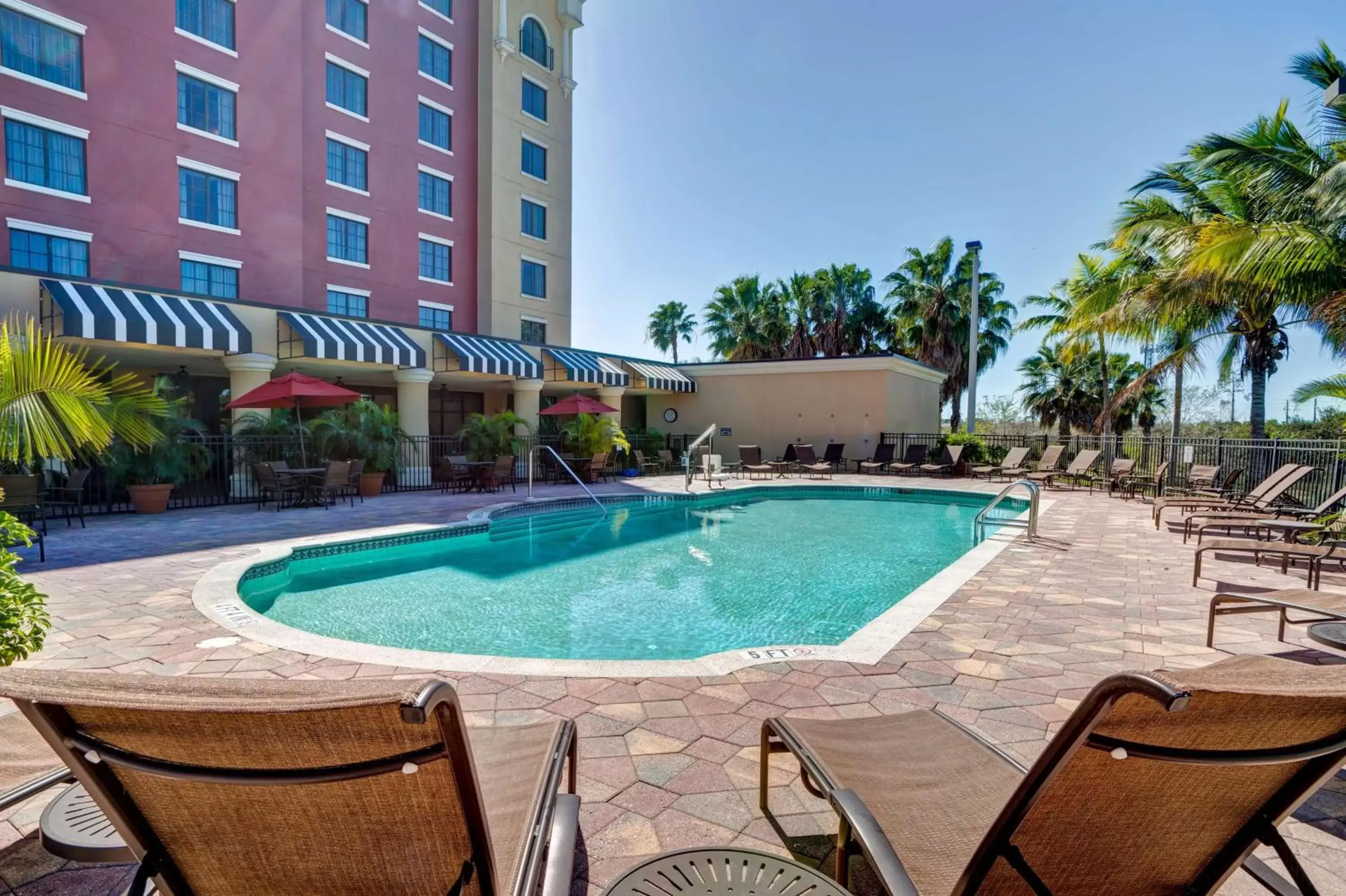 Property building, Swimming Pool in Embassy Suites Fort Myers - Estero