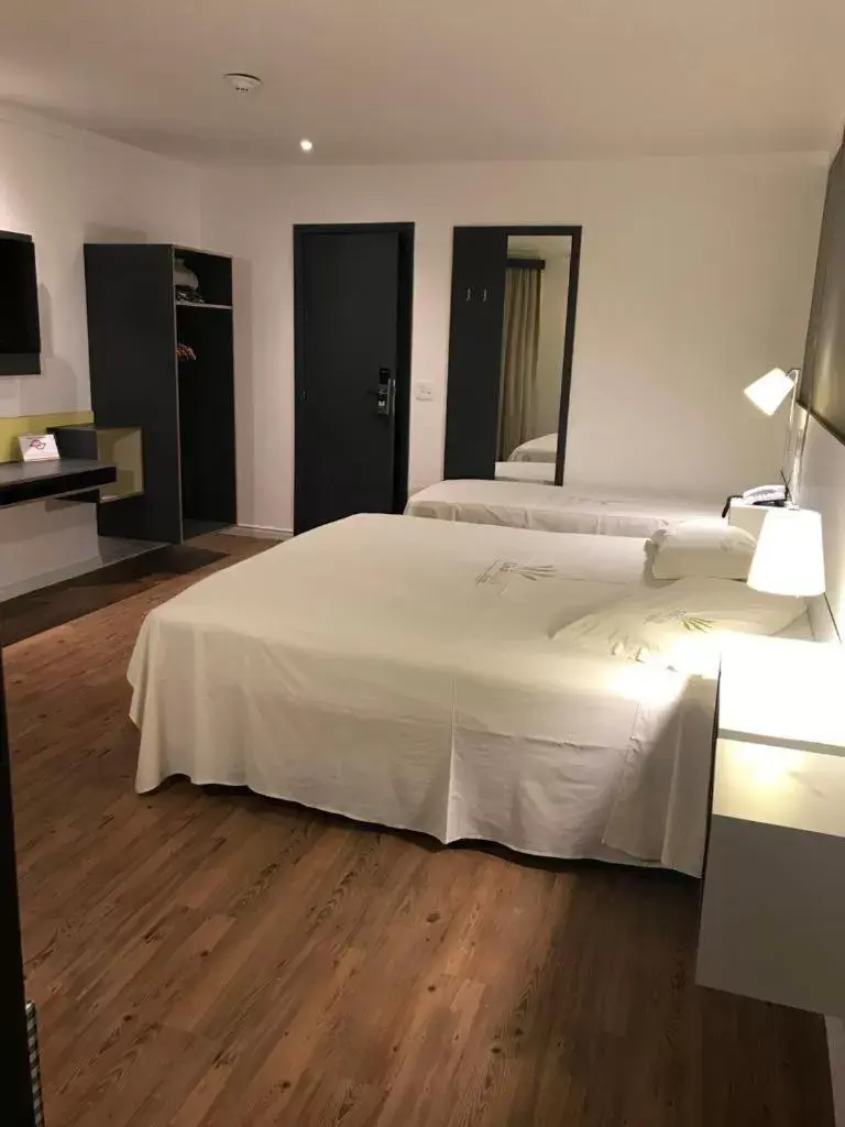 Bedroom, Bed in Uniclass Hotel Pinheiros