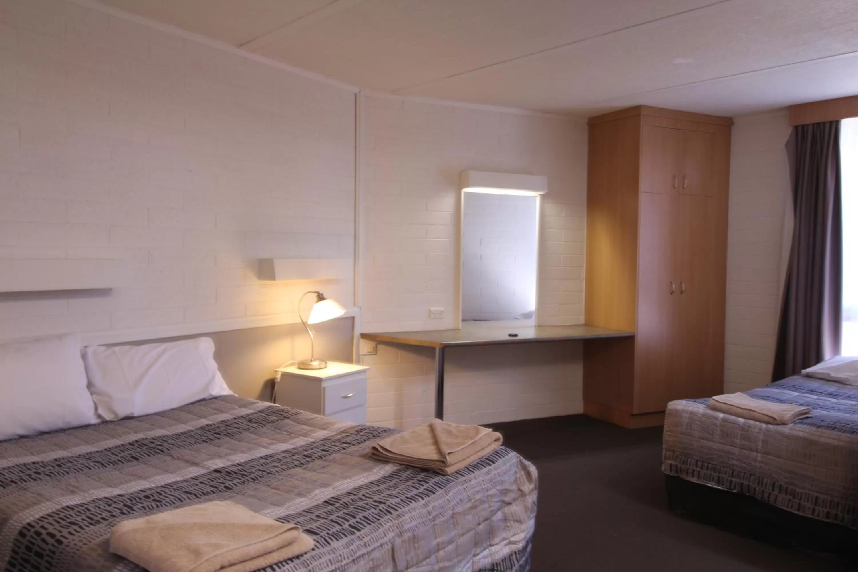 Bed in Cobram Colonial Motor Inn