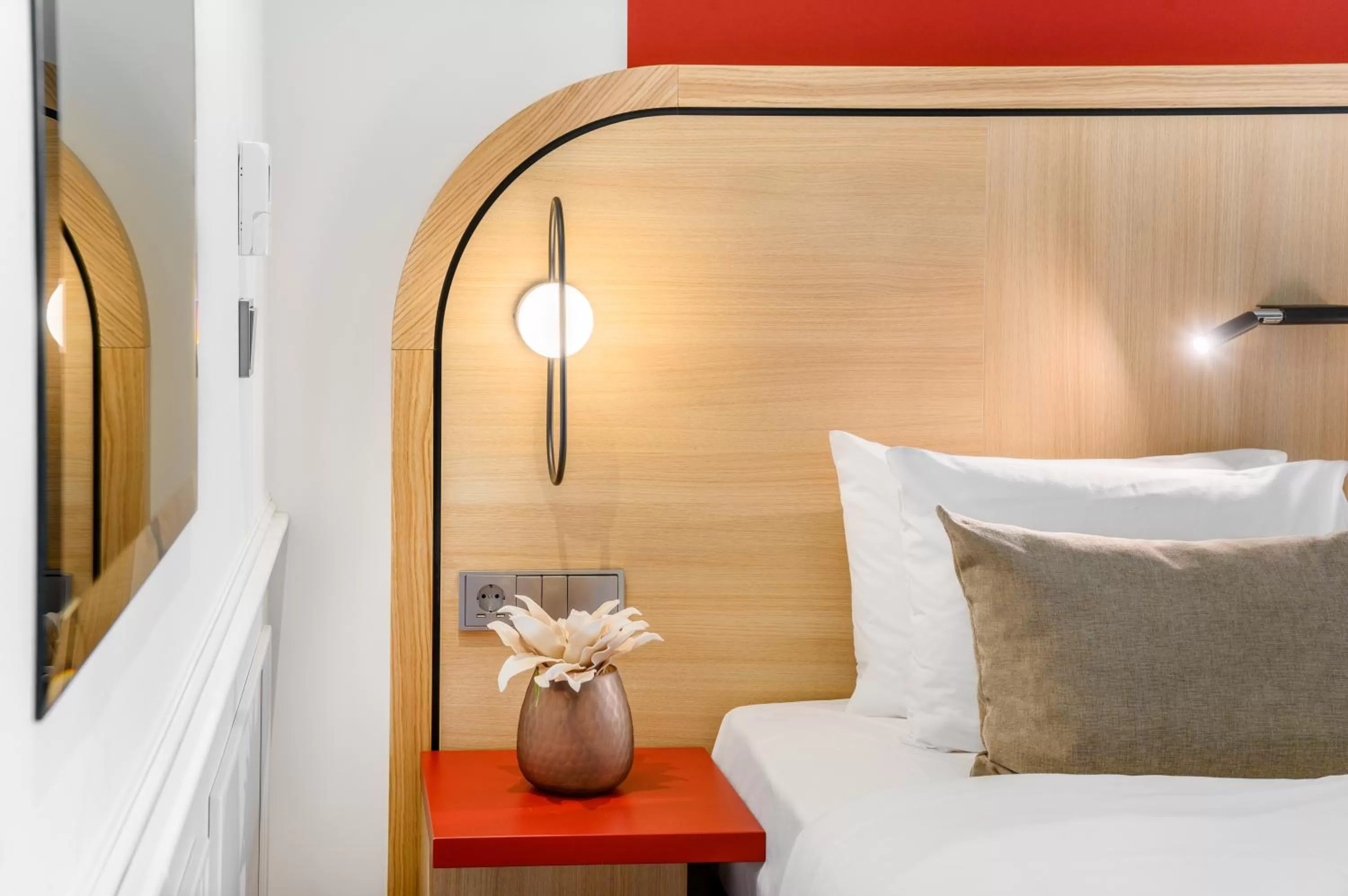 Bed in Hotel Oktogon Haggenmacher by Continental Group