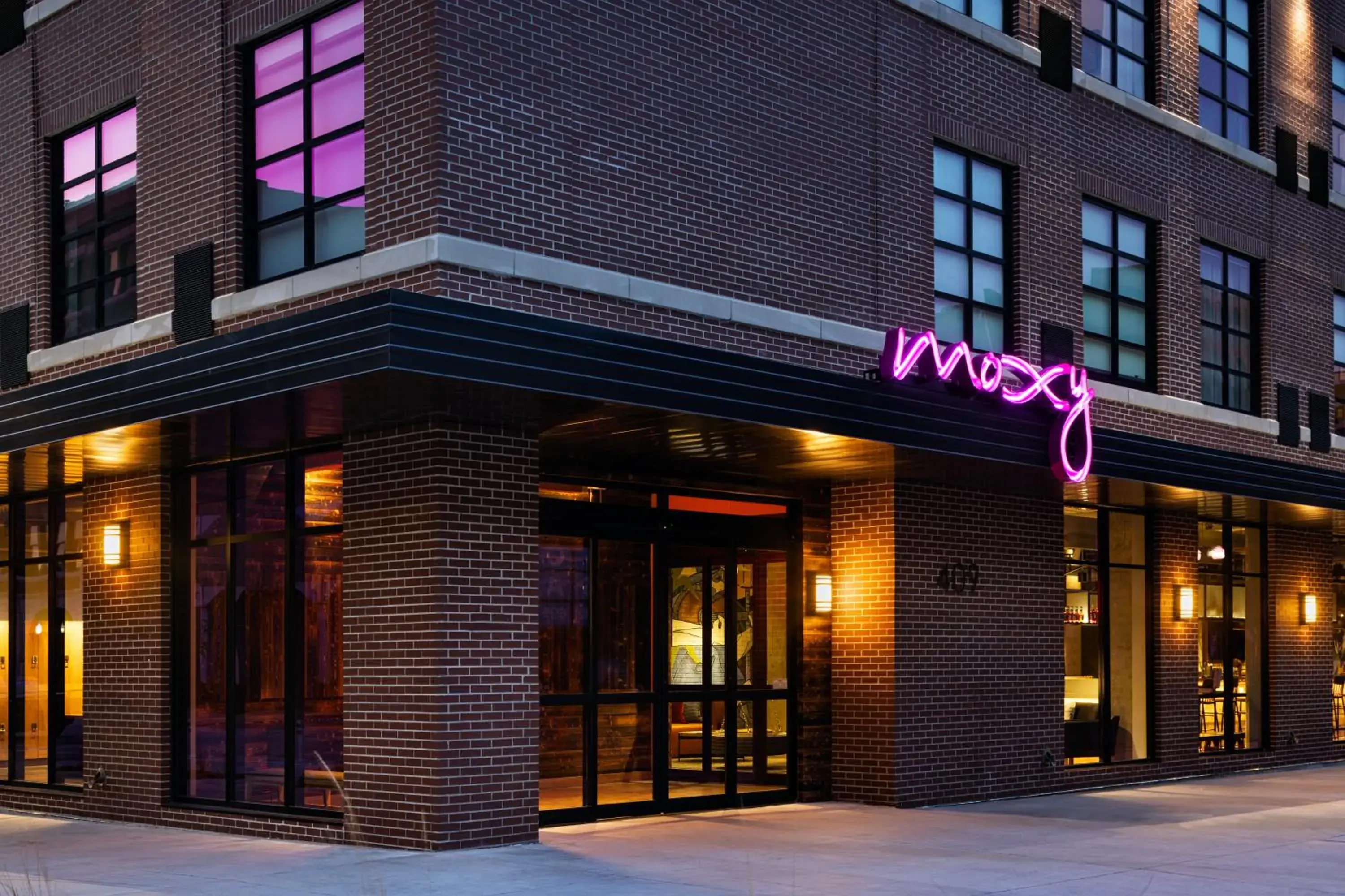 Property logo or sign in Moxy Omaha Downtown