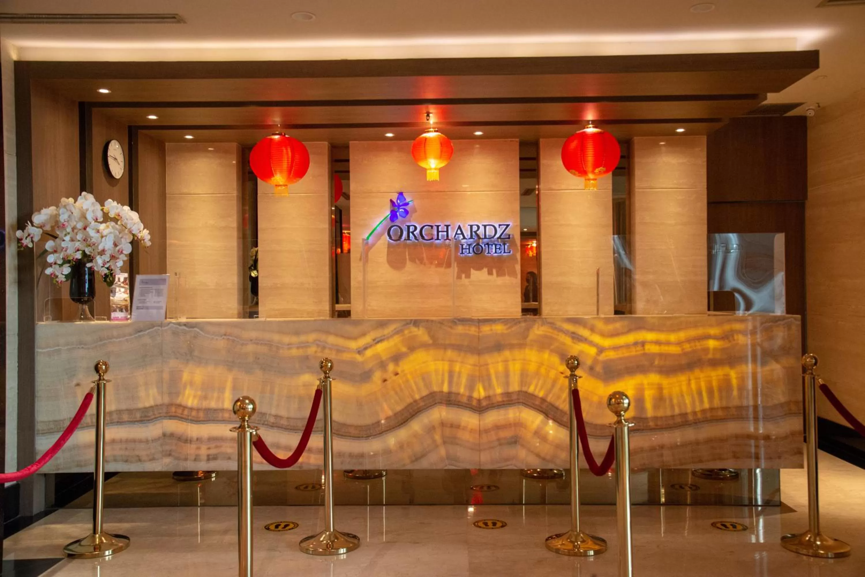Lobby or reception in Orchardz Hotel Industri Jakarta Kemayoran