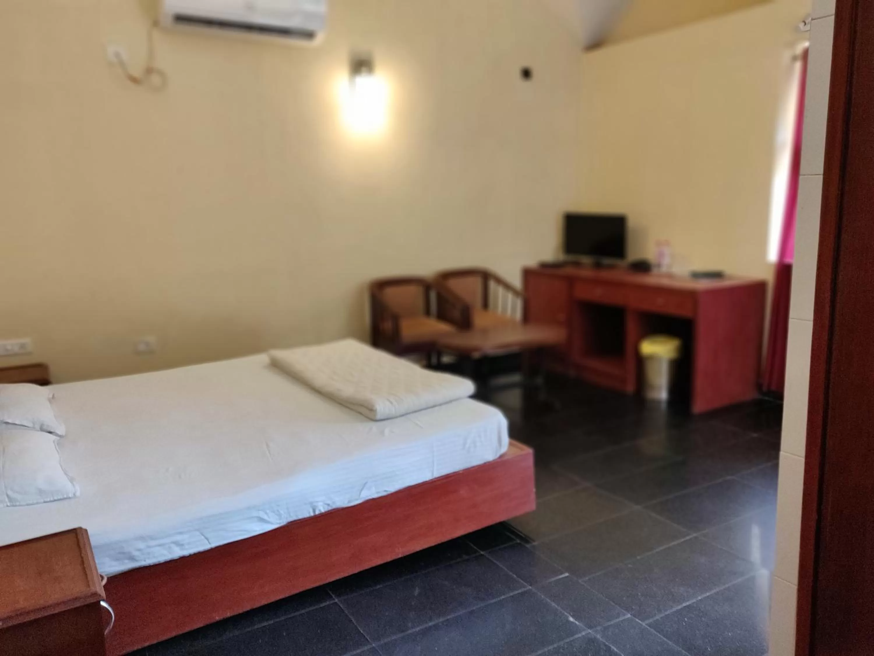 Bed in Malpe Sea Front Cottages