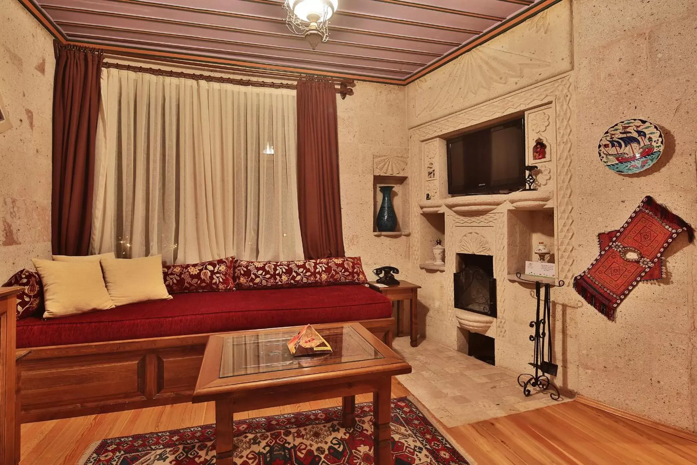 TV and multimedia, Seating Area in Cappadocia Cave Suites