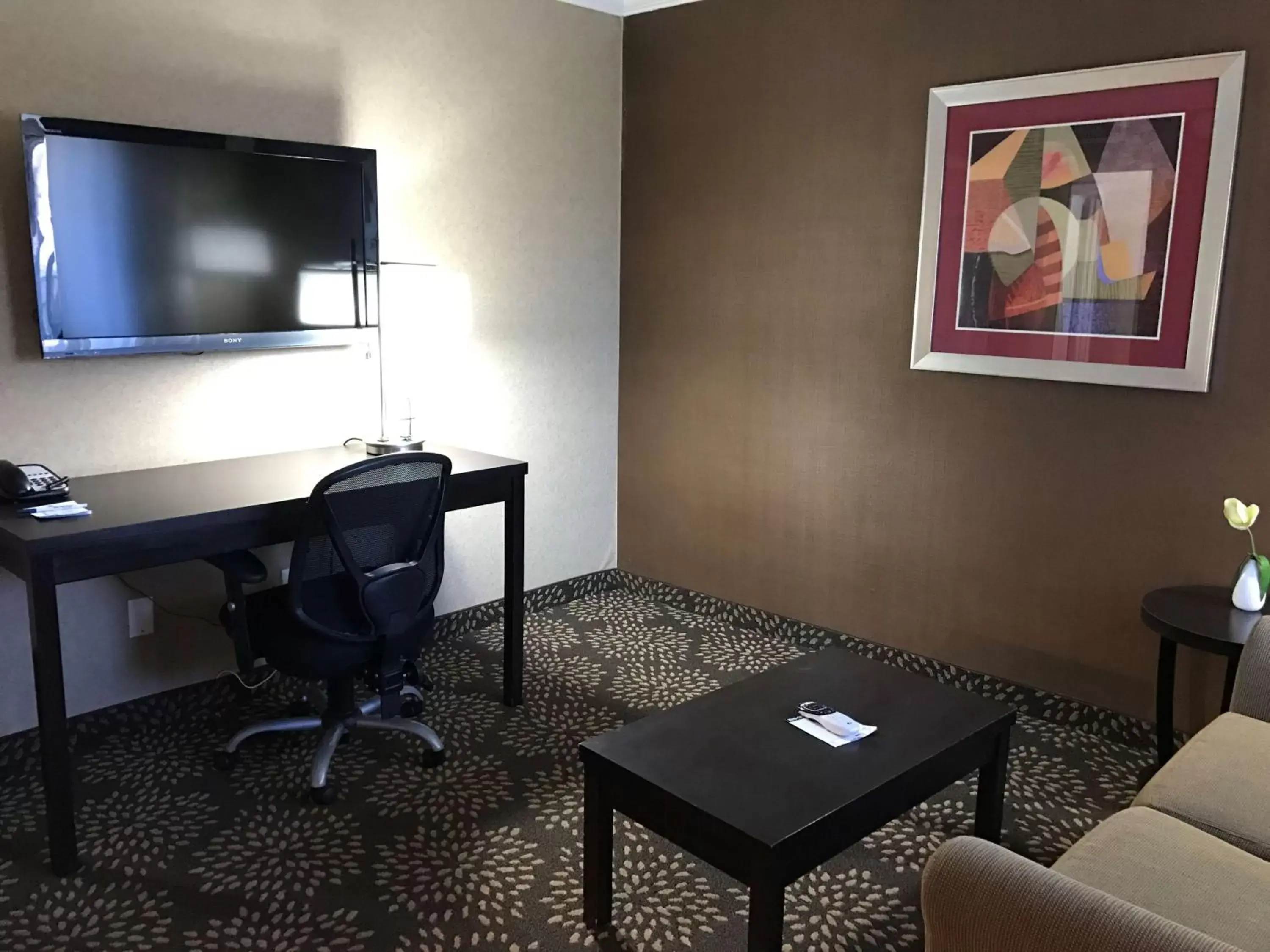Photo of the whole room, TV/Entertainment Center in Best Western Yuma Mall Hotel & Suites