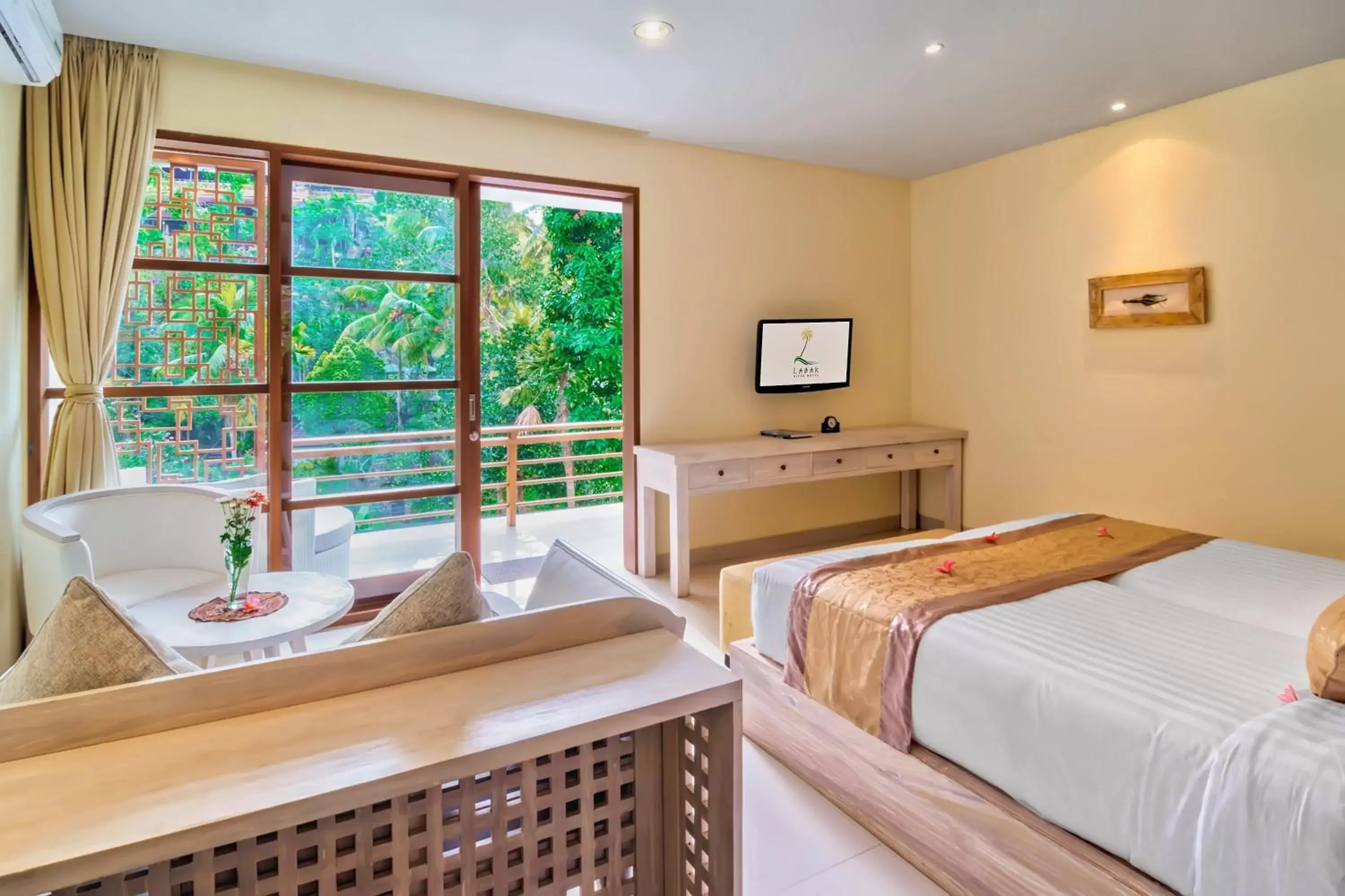 Patio, Bed in Labak River Hotel by EPS Patio, Bed in Labak River Hotel by EPS