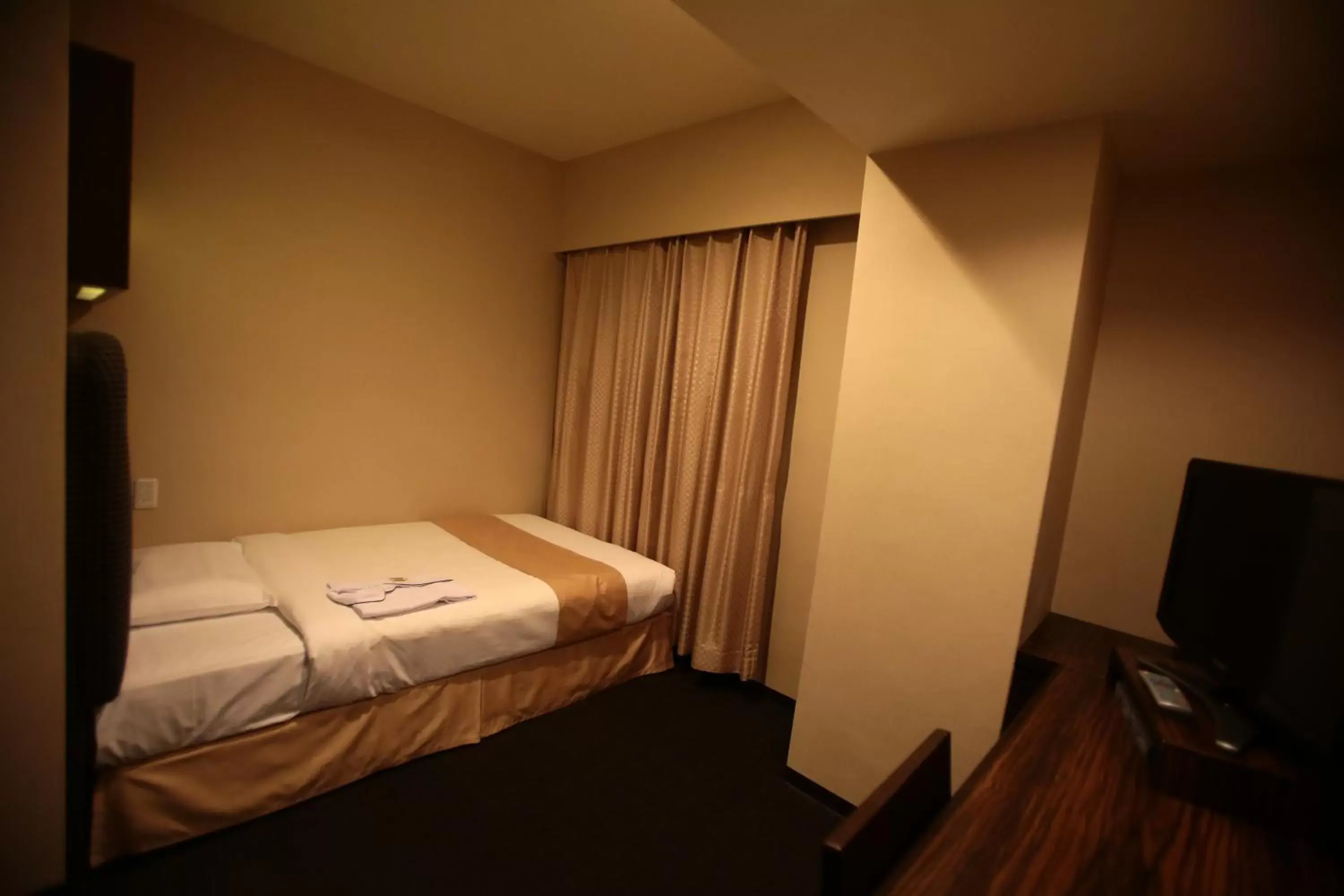 Photo of the whole room, Bed in International Hotel Ube