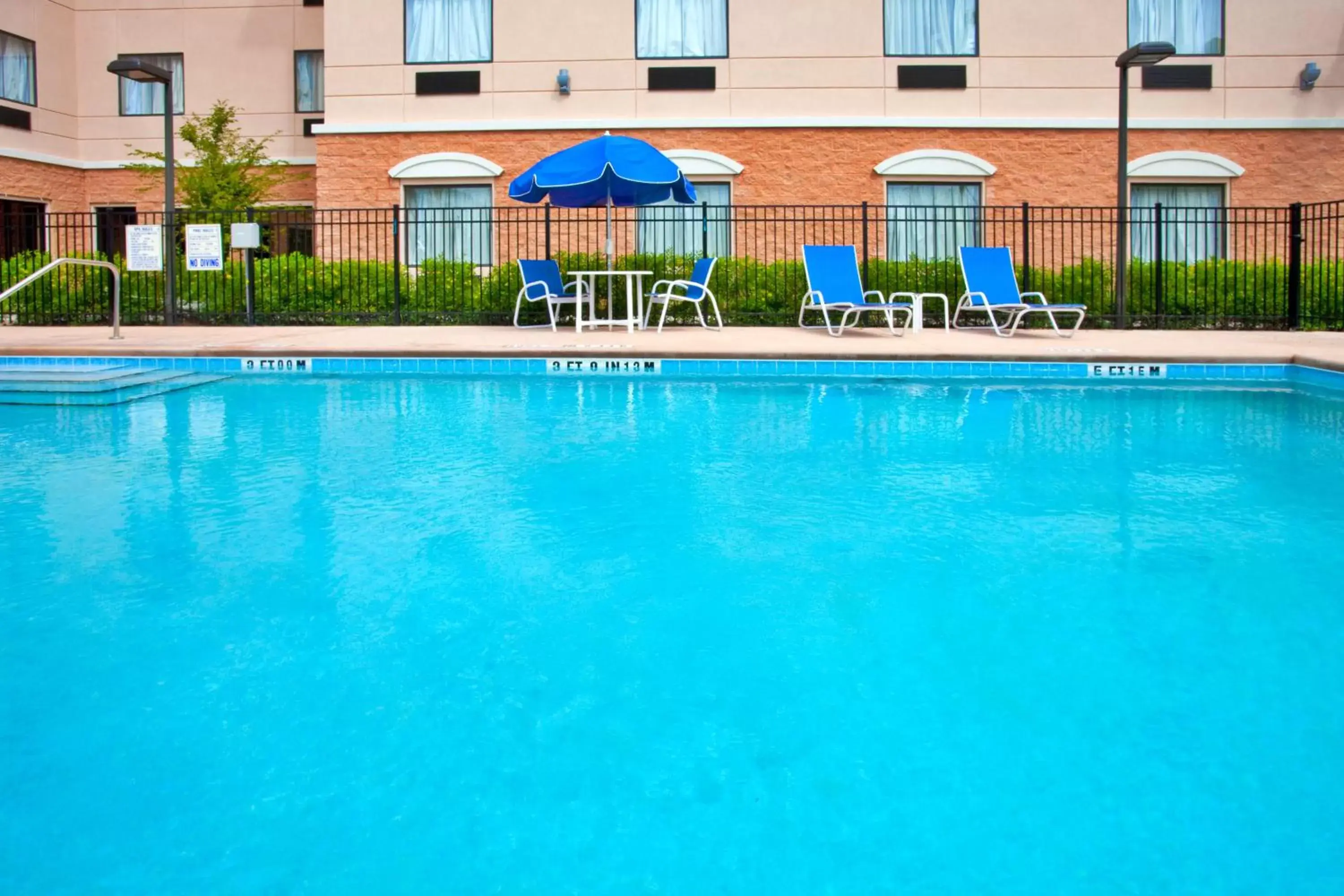 Swimming Pool in Holiday Inn Express Orlando-Ocoee East, an IHG Hotel