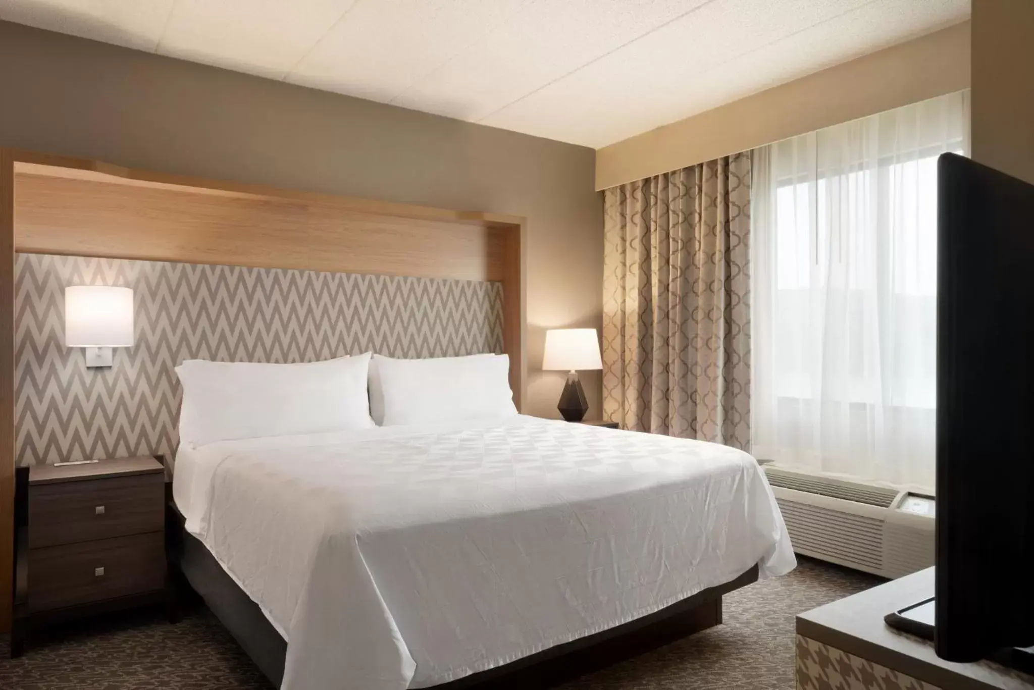 Photo of the whole room, Bed in Holiday Inn Hotel & Suites Council Bluffs, an IHG Hotel