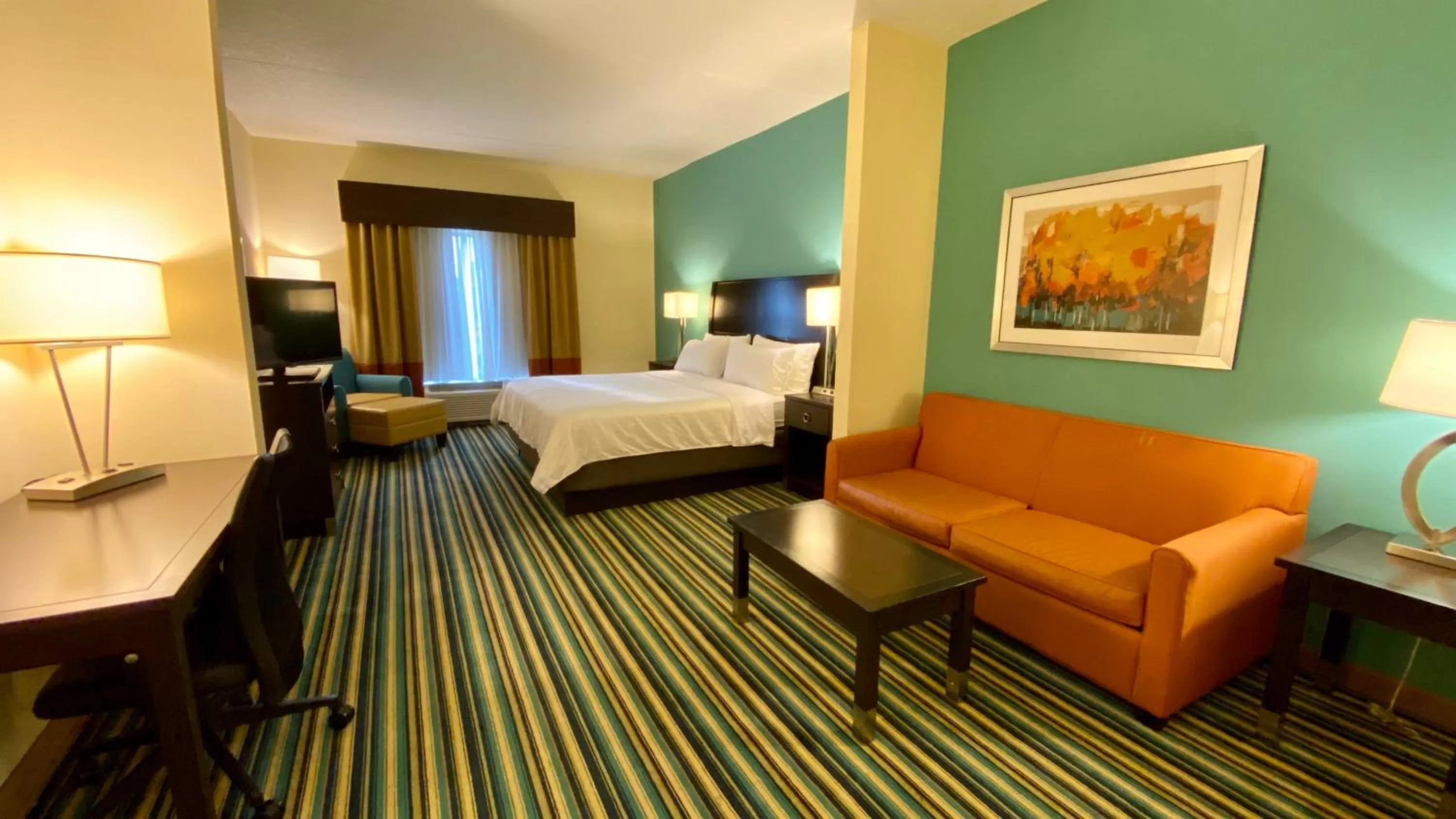 Photo of the whole room, Bed in Holiday Inn Express Hotel & Suites Orlando East-UCF Area by IHG