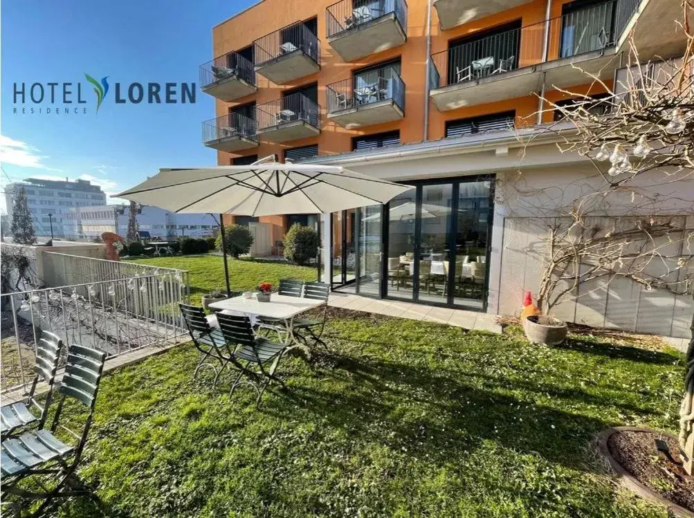 Garden, Property Building in Hotel Residence Loren - contact & contactless check-in