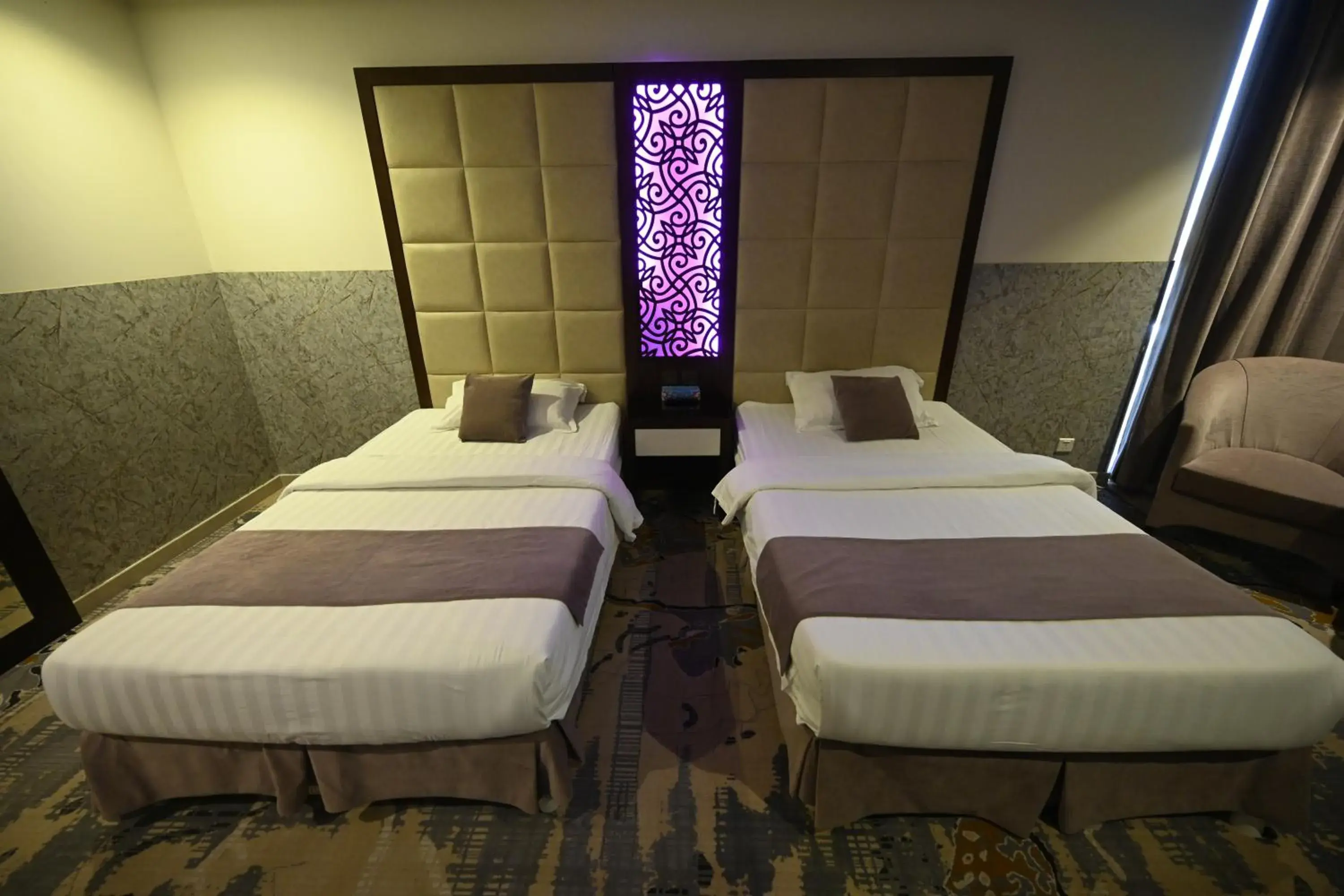 Bed in ASTER HOTEL