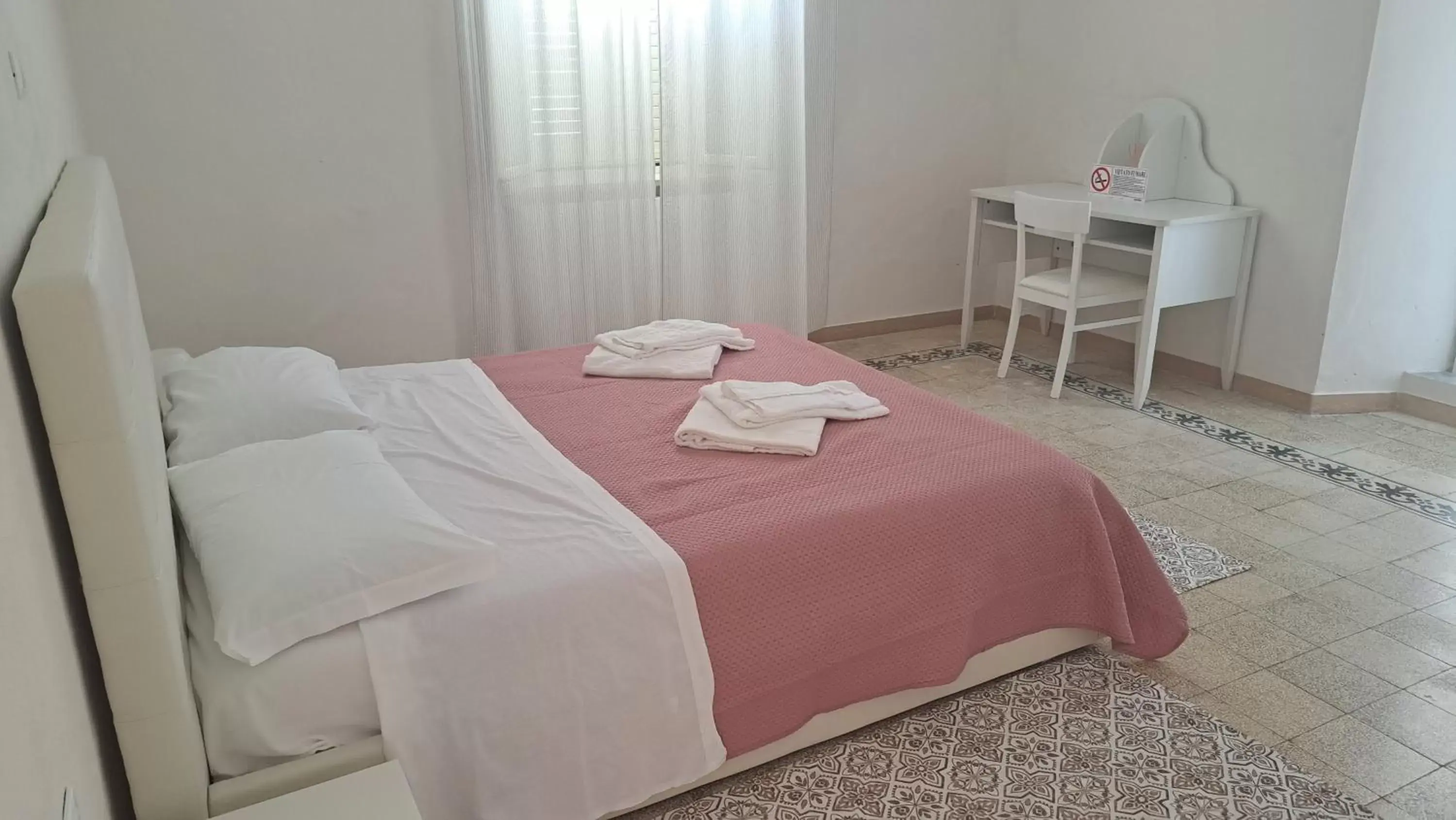 Bed in B & B le tre rose