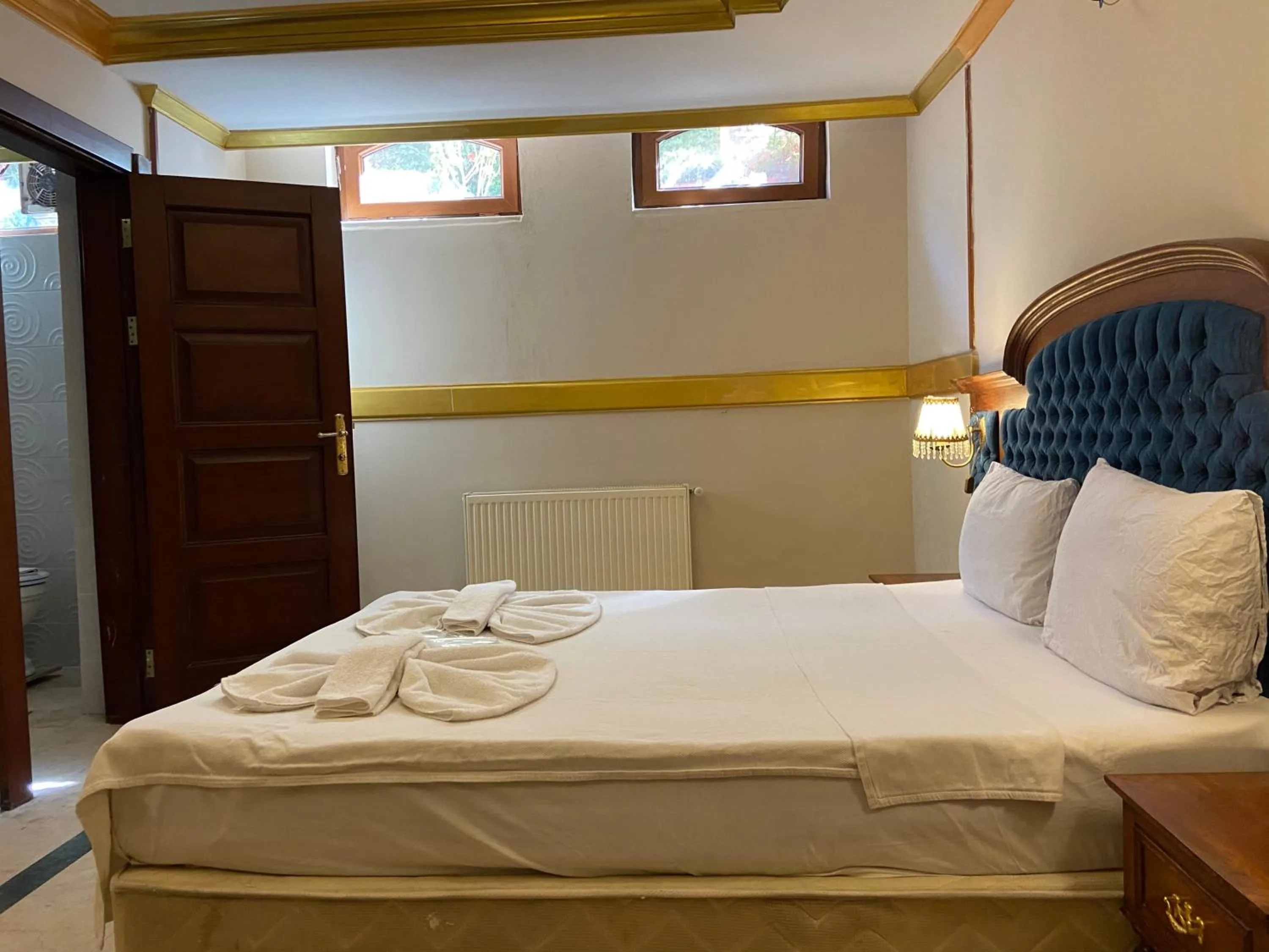 Bed in Aruna Boutique Hotel