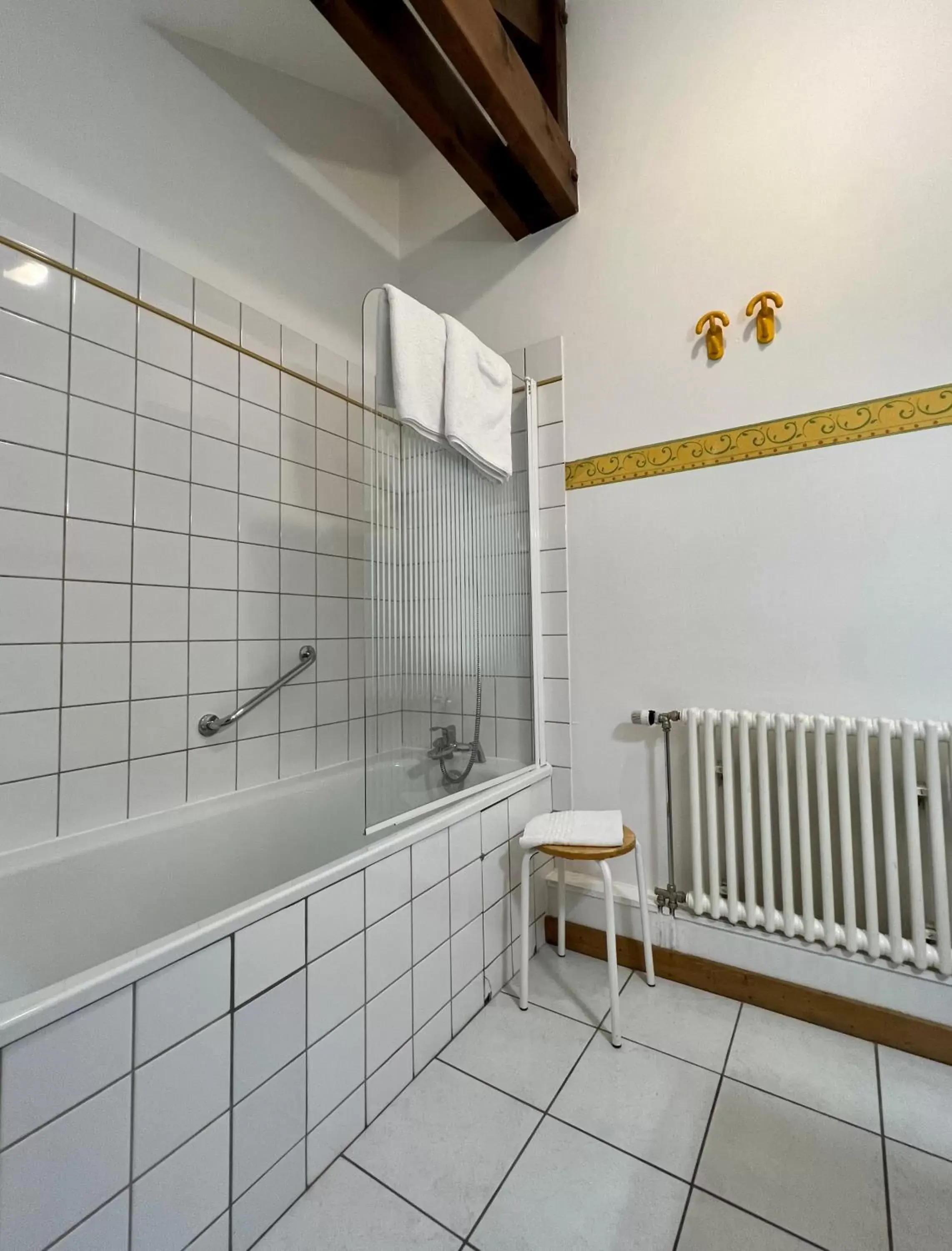 Bathroom in Logis Hôtel Les Chatelminés
