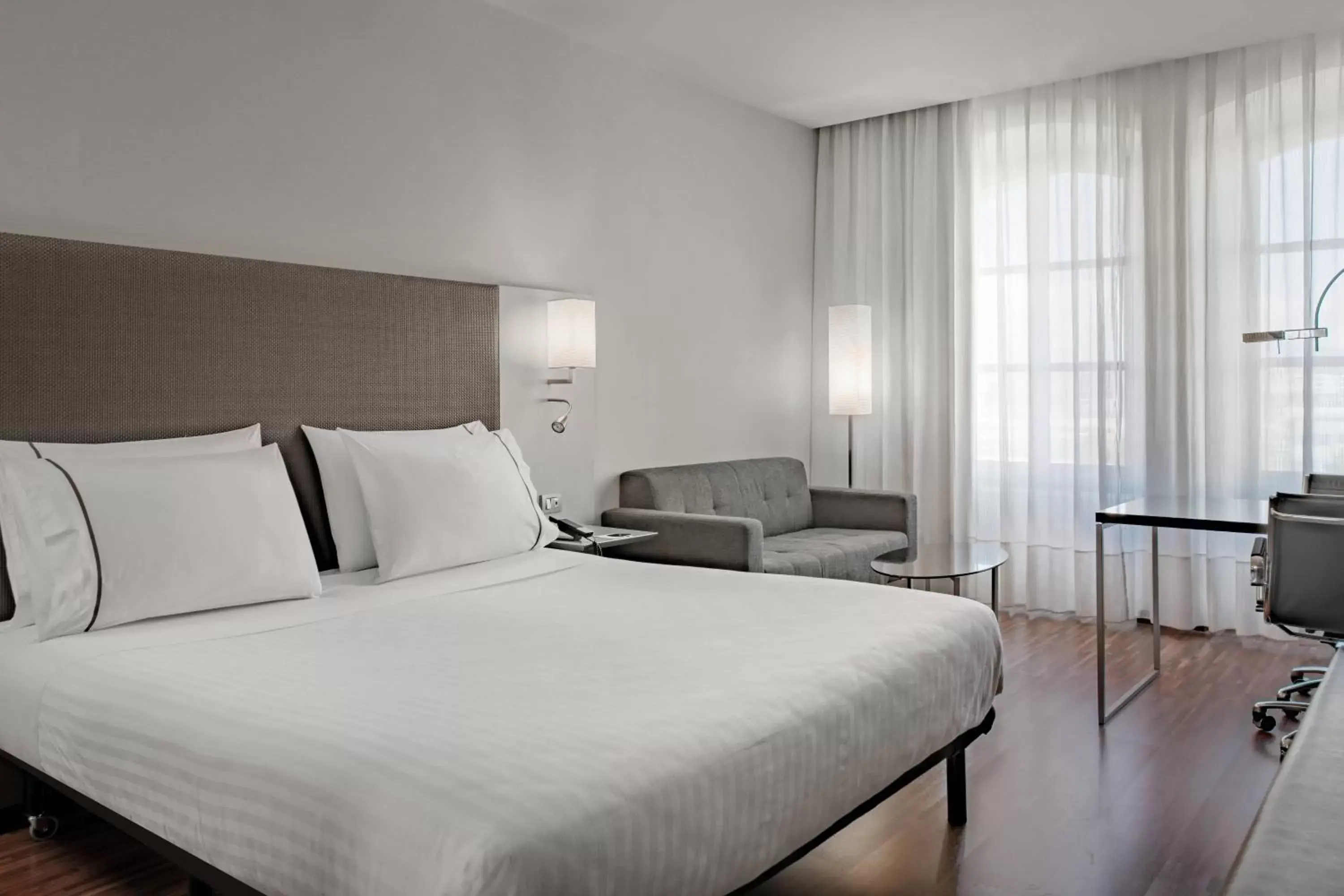 Photo of the whole room, Bed in AC Hotel Torino by Marriott