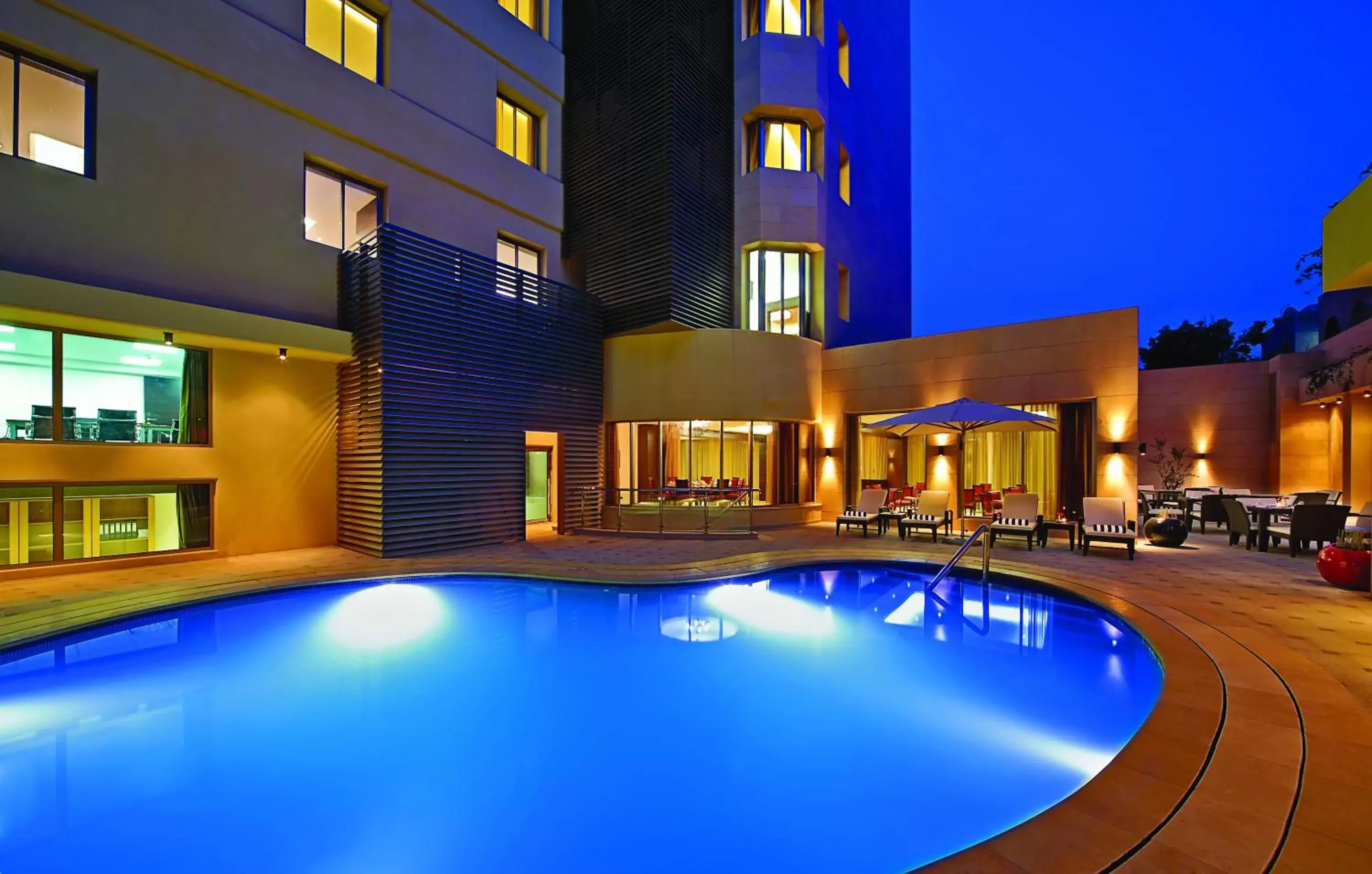 Swimming pool, Property Building in Corp Amman Hotel