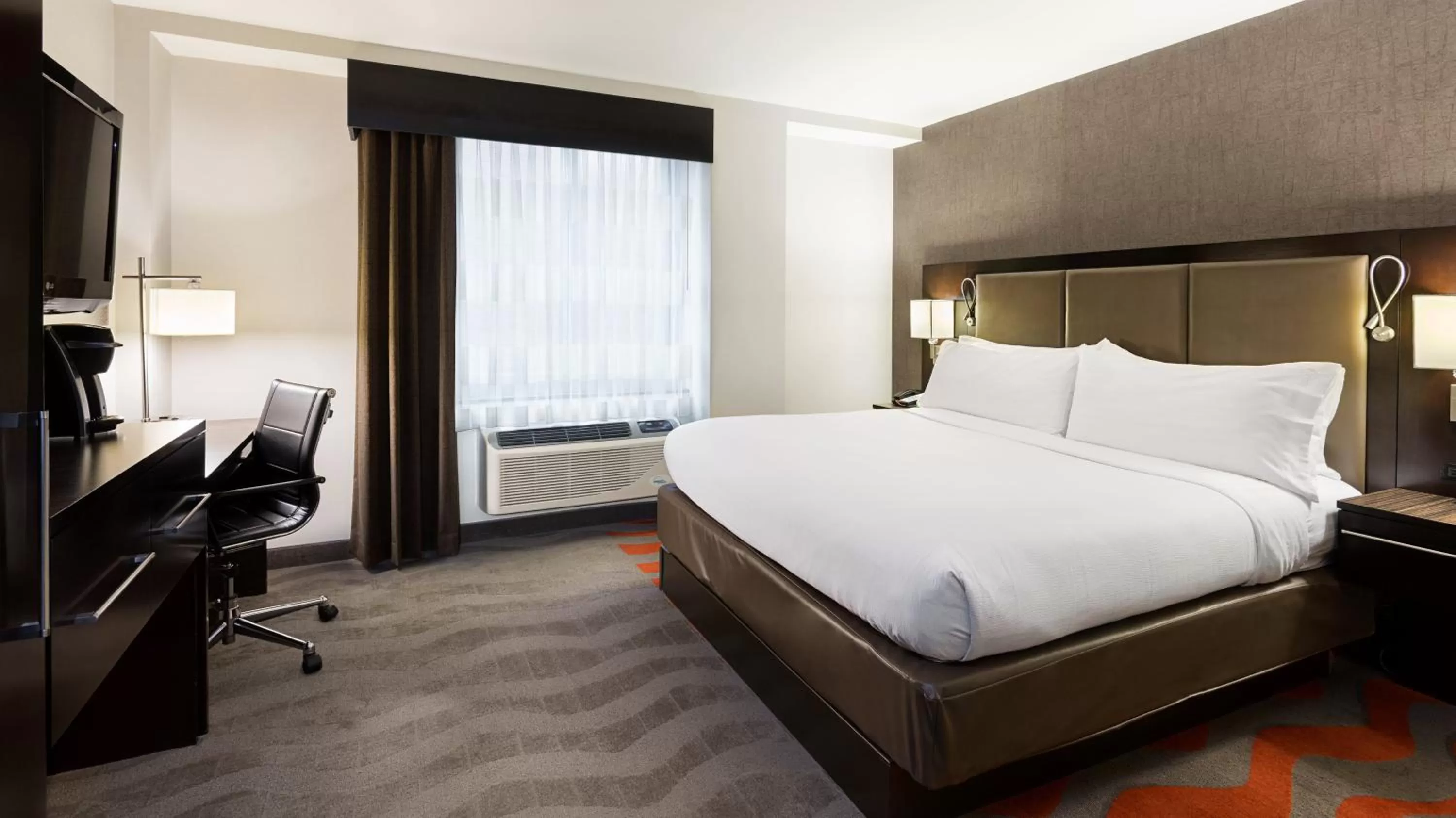Photo of the whole room, Bed in Holiday Inn Lower East Side by IHG