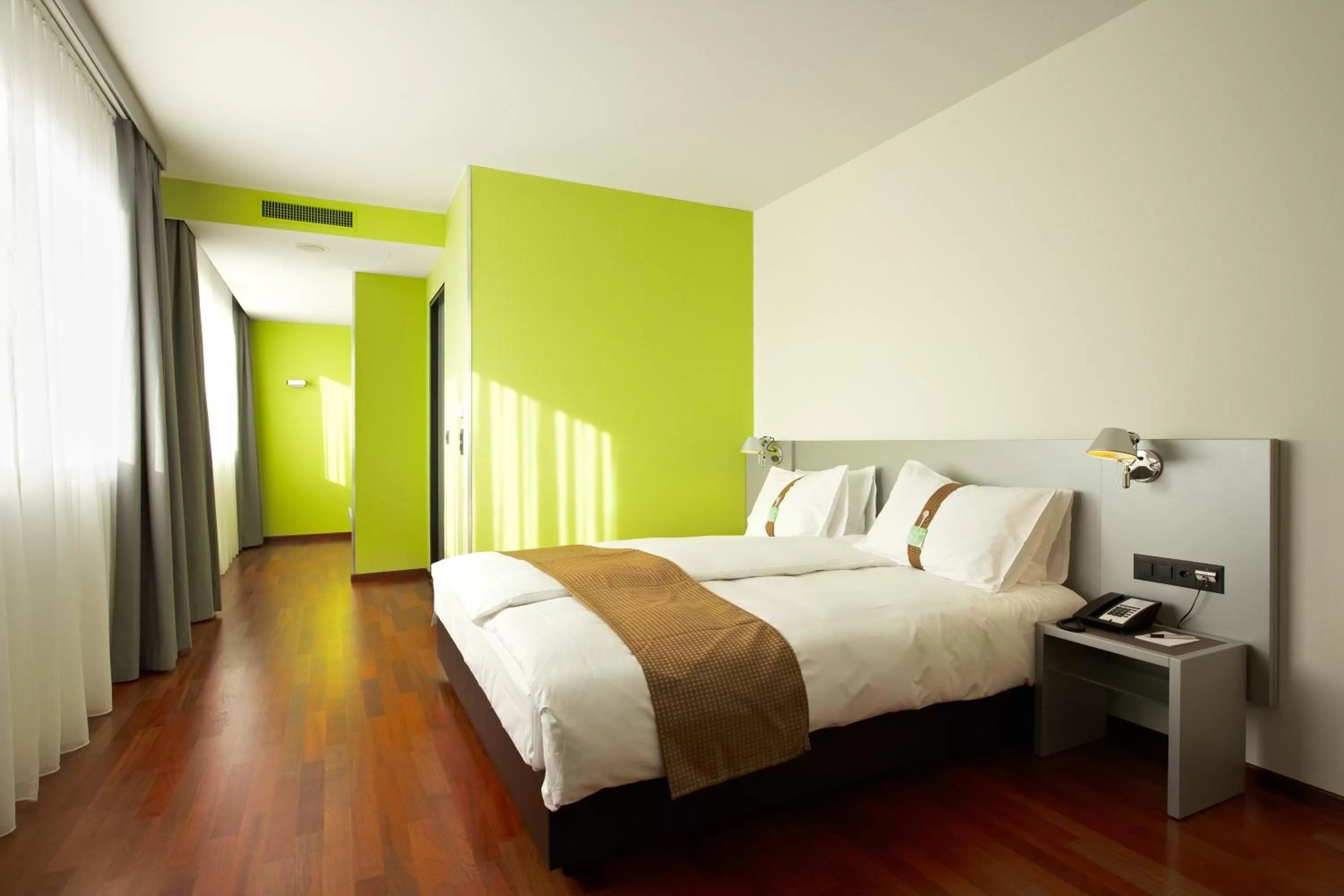 Photo of the whole room, Bed in Holiday Inn Zürich Messe by IHG