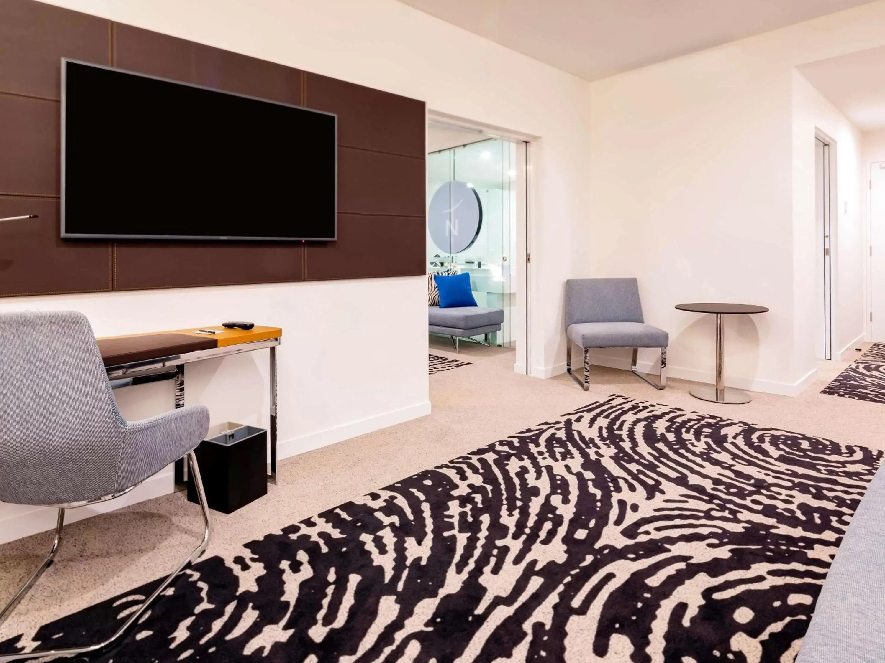 Photo of the whole room, TV/Entertainment Center in Novotel Brisbane South Bank