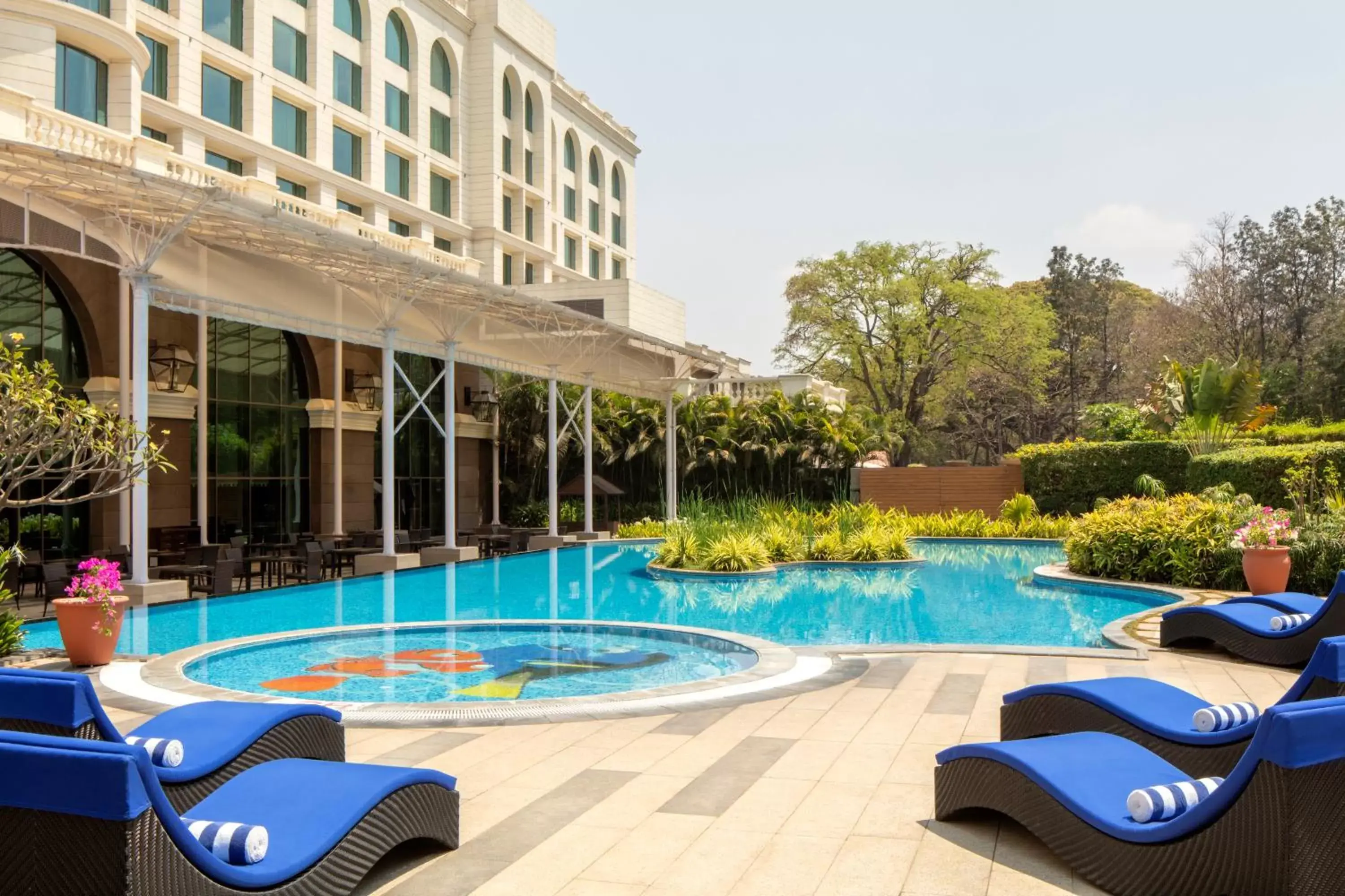 Swimming pool in Radisson Blu Plaza Hotel Mysore