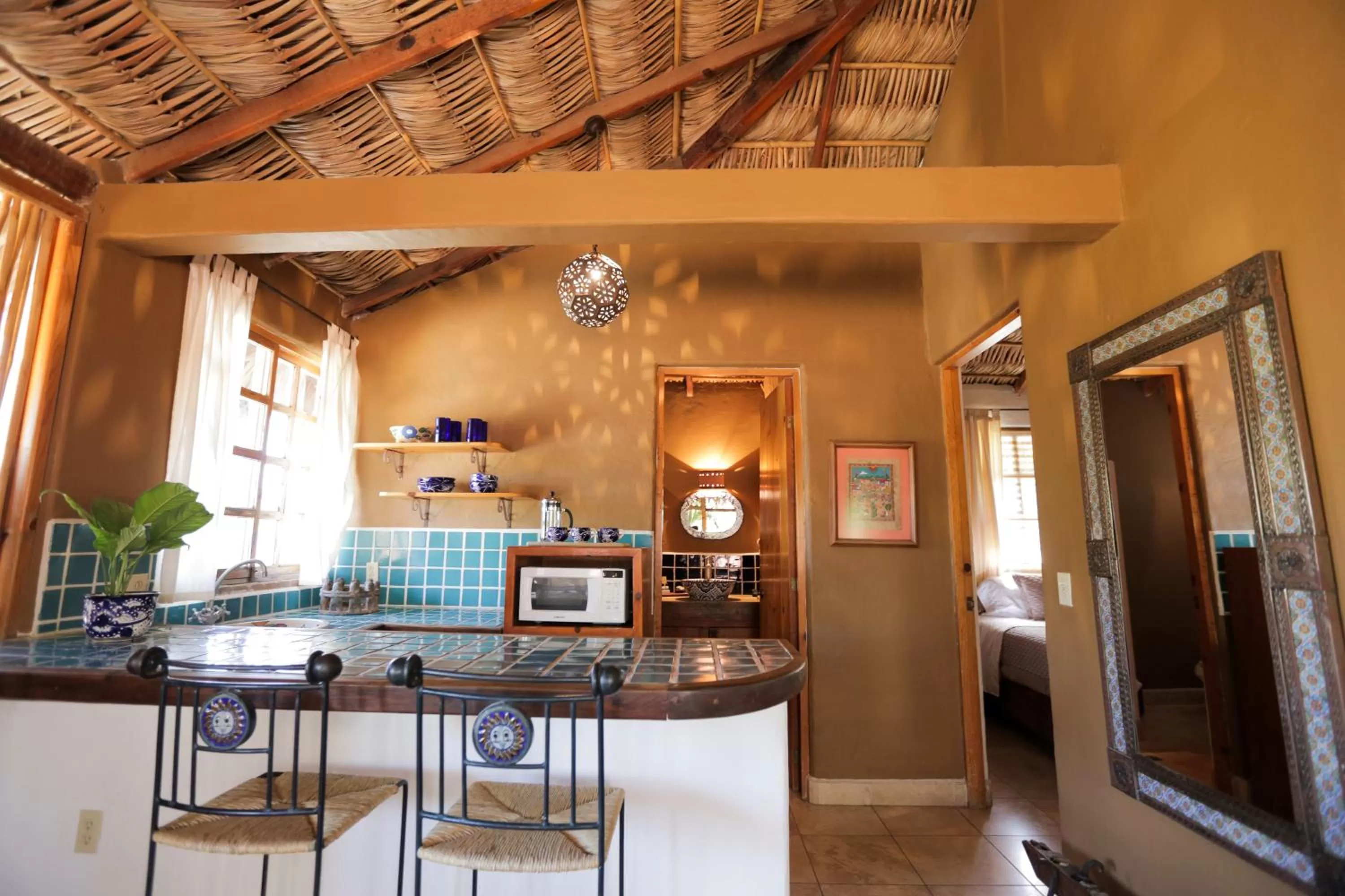 Kitchen or kitchenette in The Bungalows Hotel