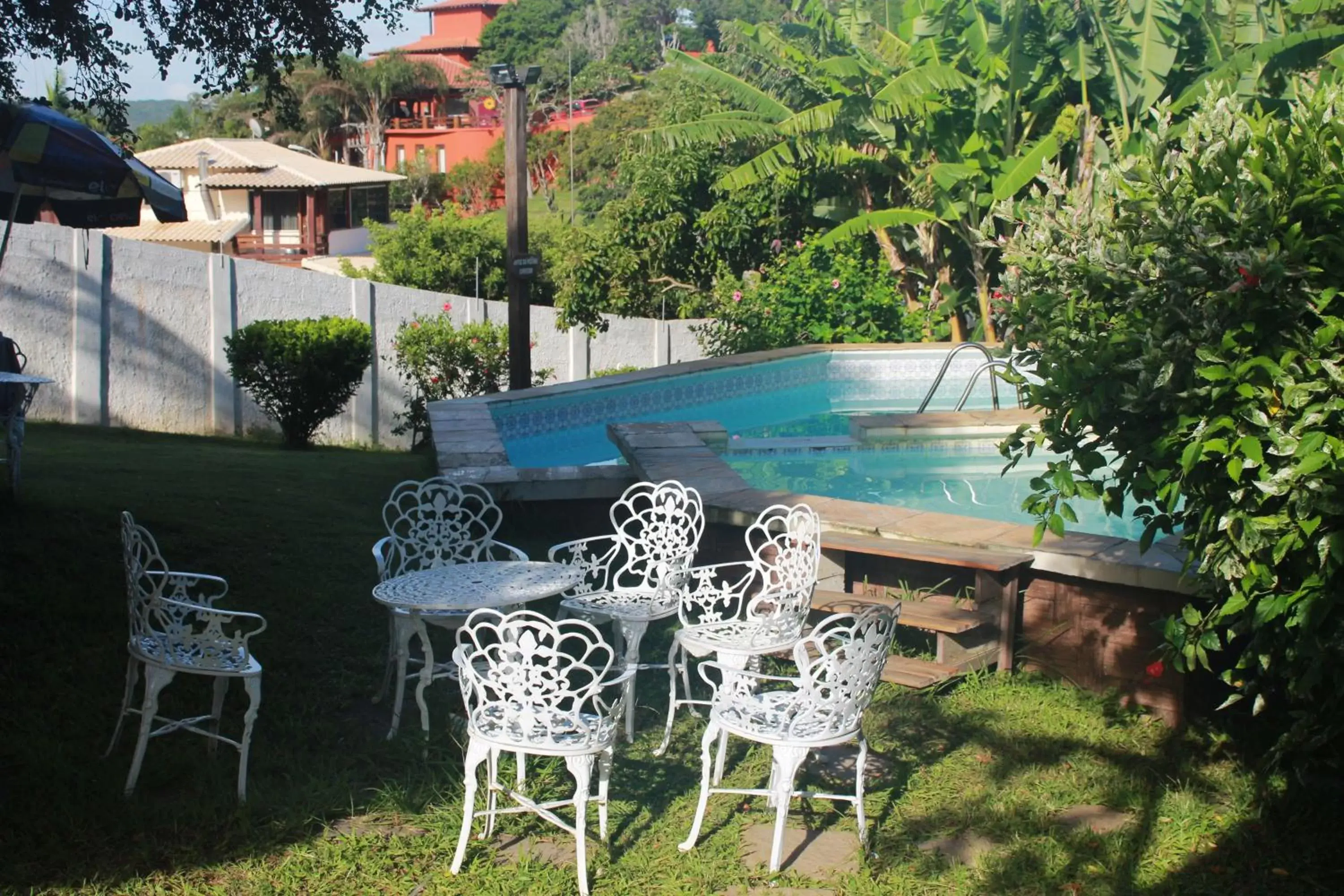 Garden view, Swimming Pool in Pousada New Paradise
