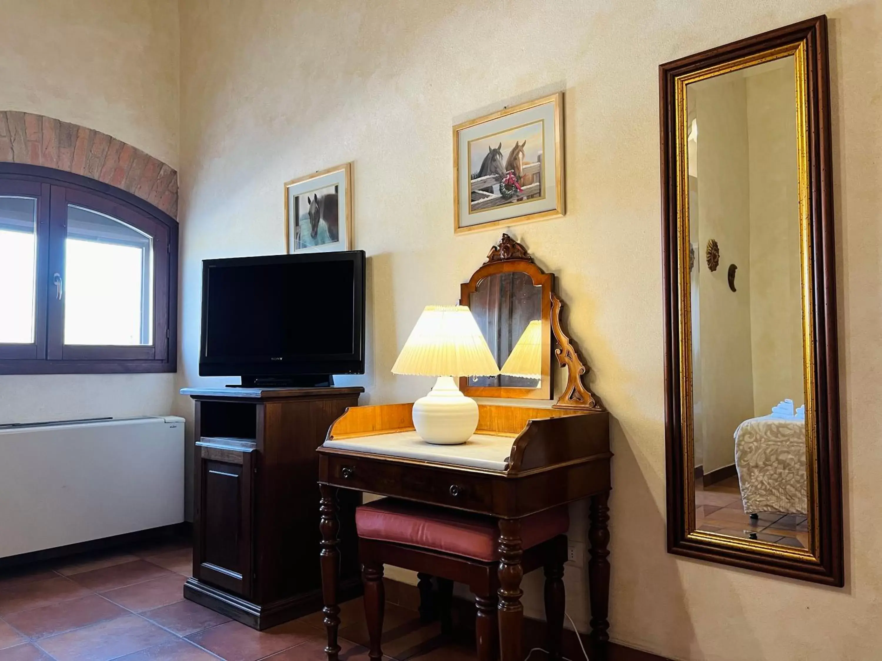 Photo of the whole room, TV/Entertainment Center in Agriturismo Sabidor