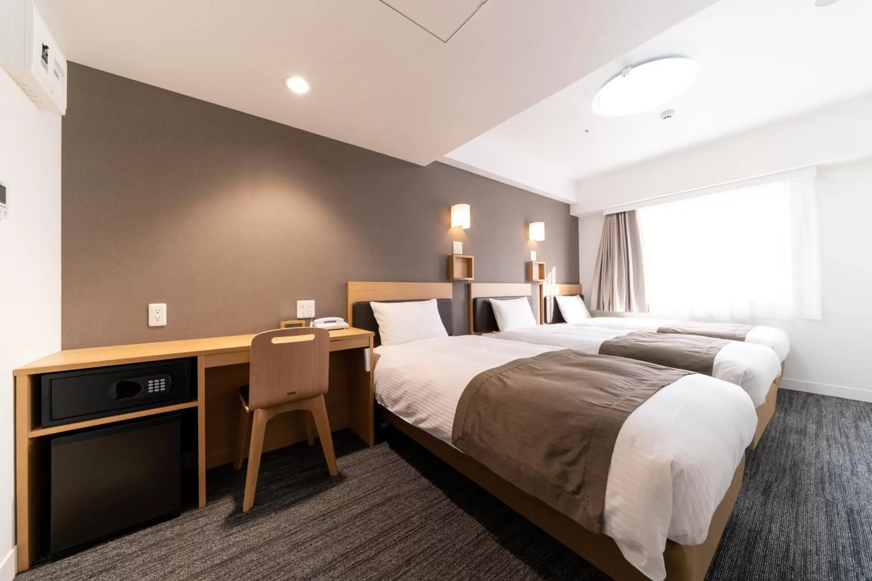 Bed in Pearl Hotel Shinjuku Akebonobashi Bed in Pearl Hotel Shinjuku Akebonobashi