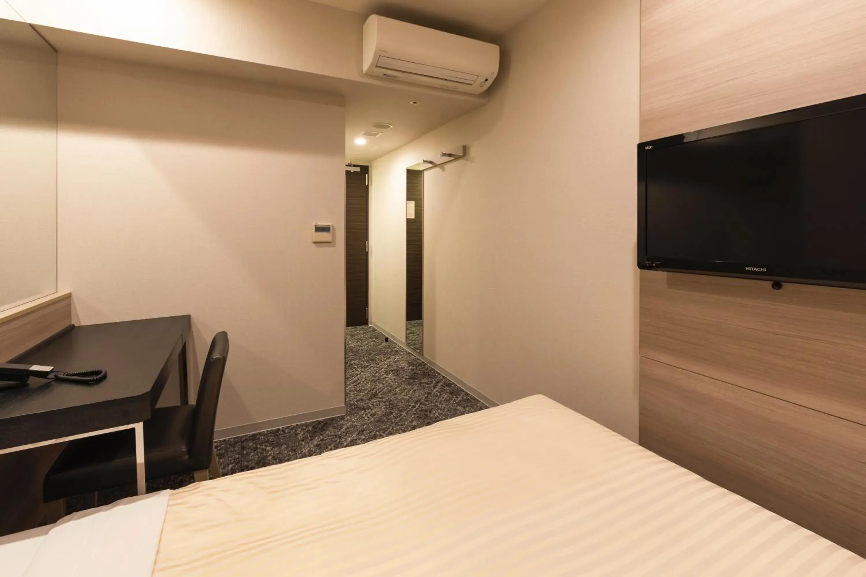 Bed in Sotetsu Fresa Inn Shimbashi Hibiyaguchi Bed in Sotetsu Fresa Inn Shimbashi Hibiyaguchi