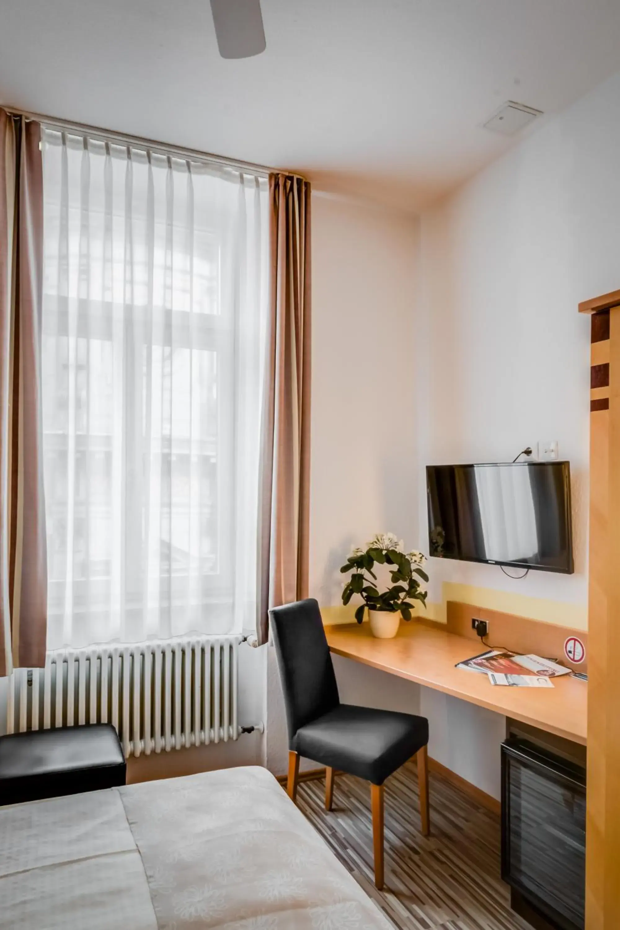 TV and multimedia, Seating Area in Gästehaus Centro