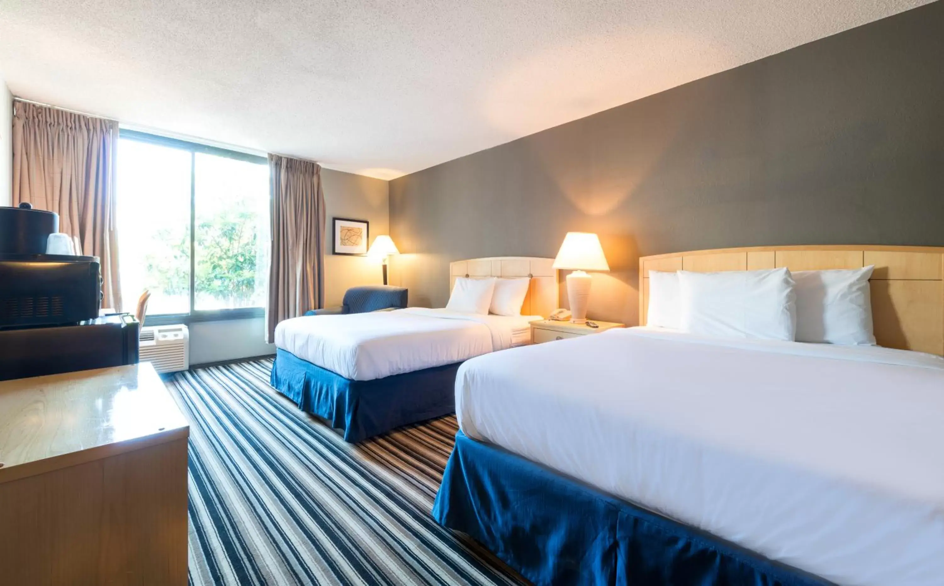 Bedroom, Bed in Travelodge by Wyndham Memphis Airport/Graceland
