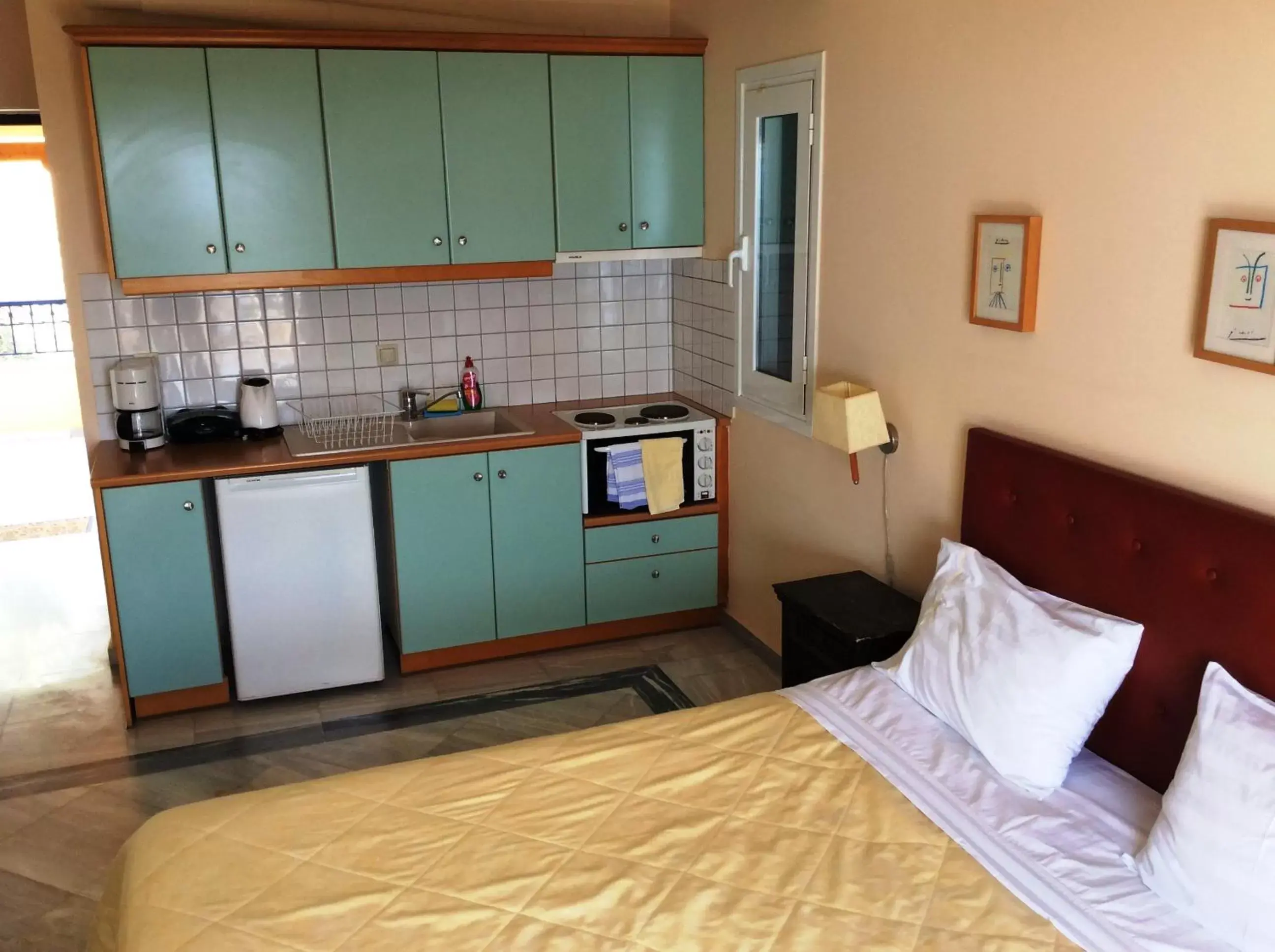Photo of the whole room, Kitchen/Kitchenette in Angelica Villas Hotel Apartments