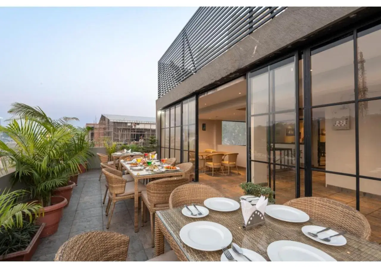 Balcony/Terrace, Restaurant/Places to Eat in Hotel Arihant By DLS Hotels