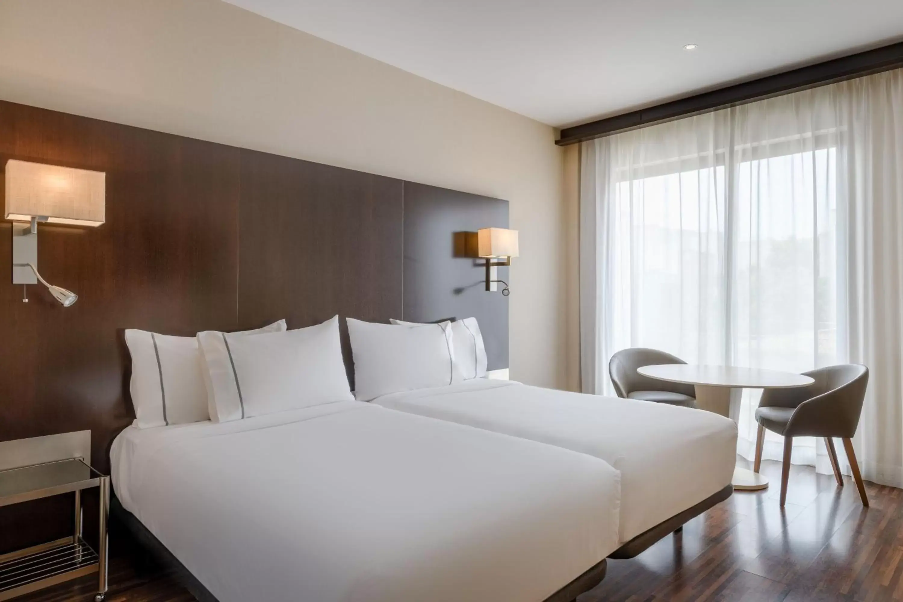 Photo of the whole room, Bed in AC Hotel Ciutat de Palma by Marriott