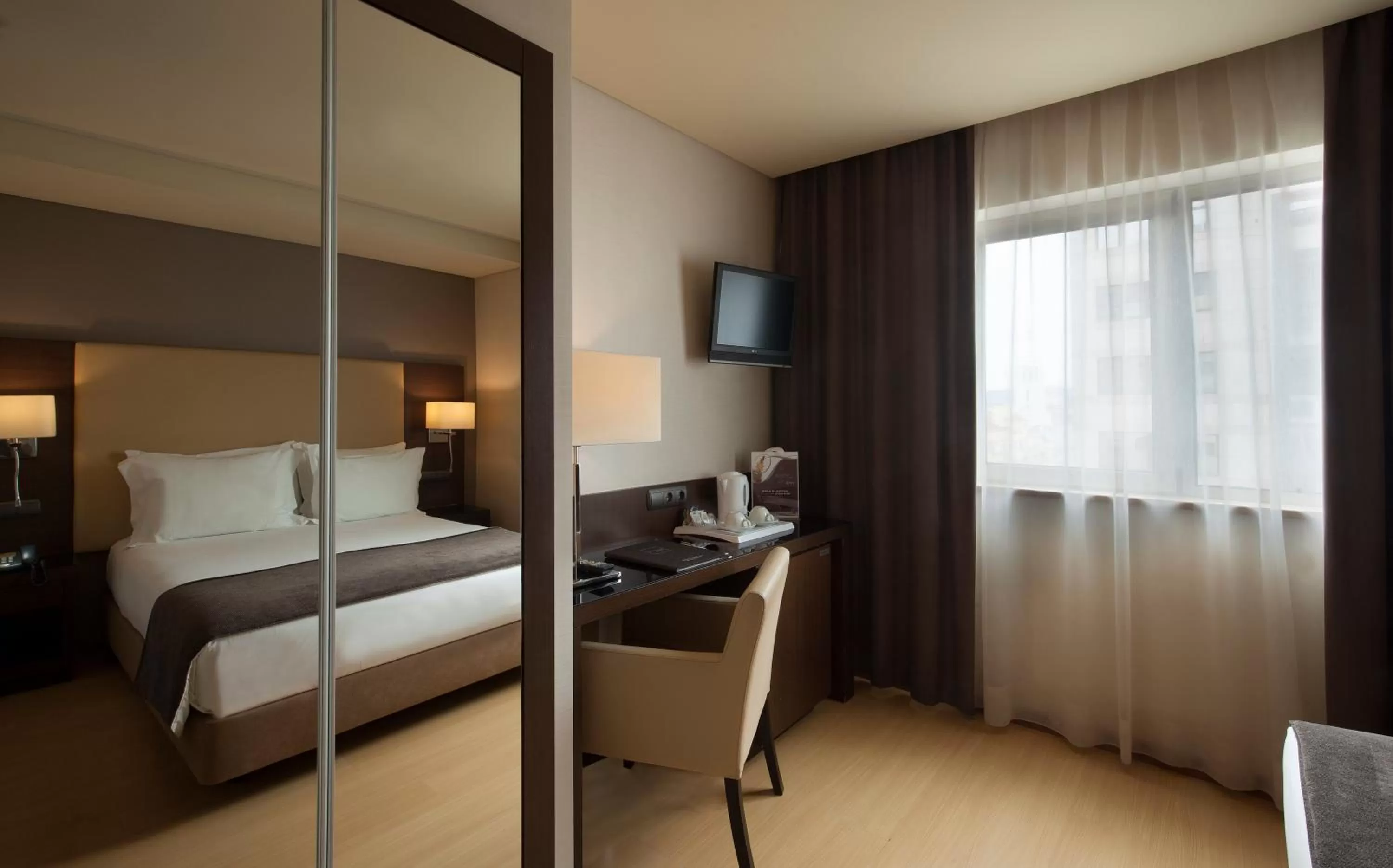 Bed in TURIM Ibéria Hotel