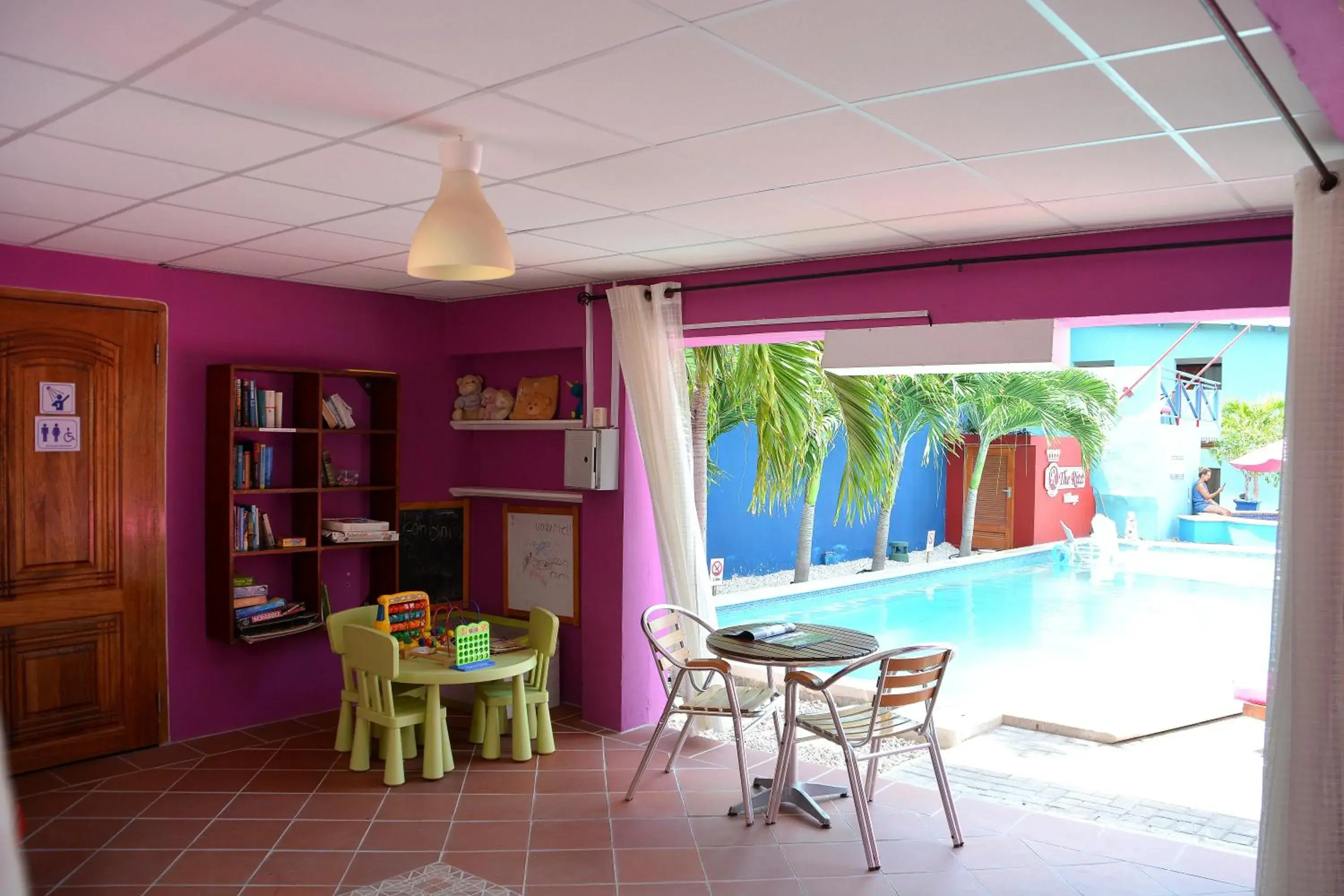 Library, Swimming Pool in First Curacao Hostel