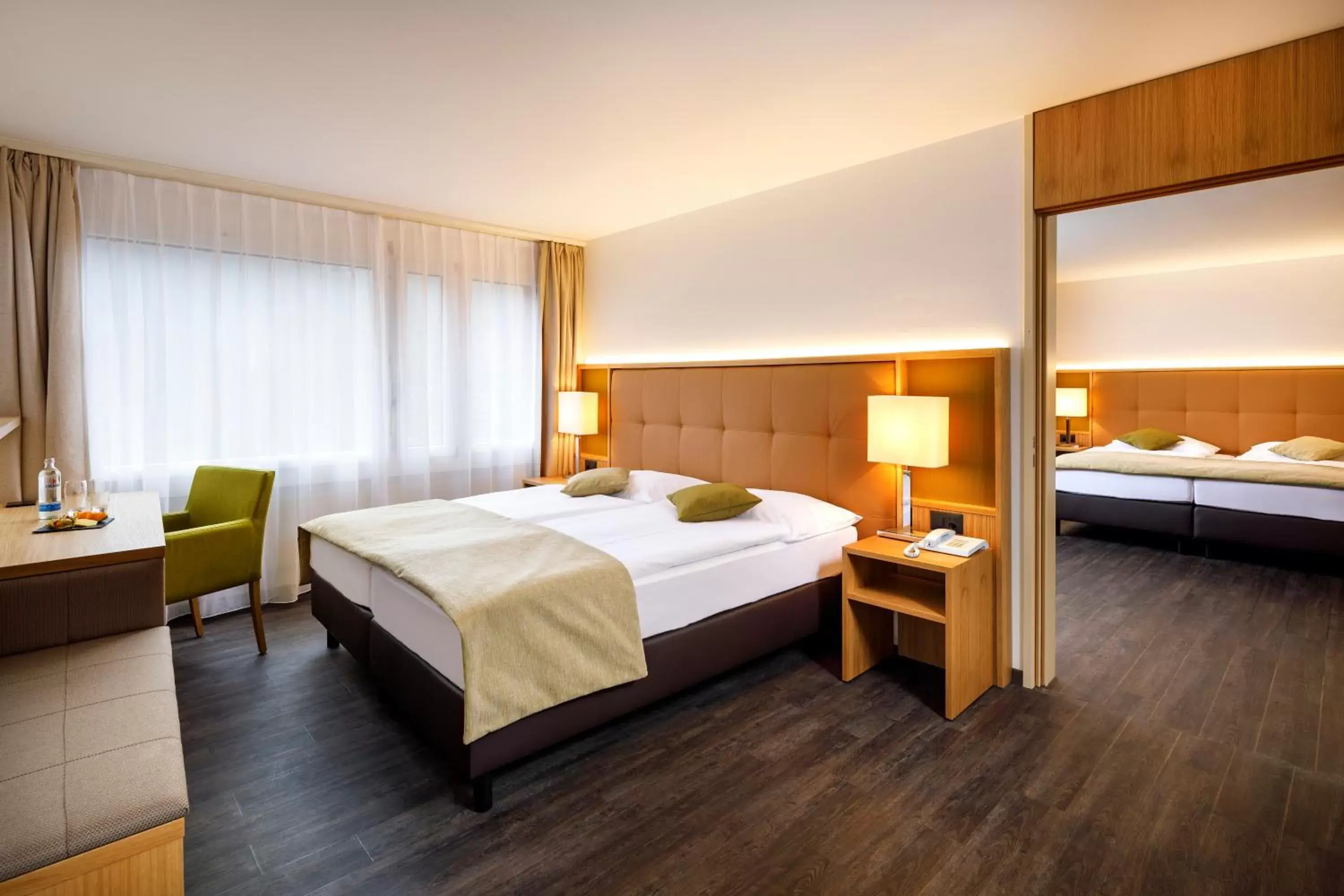 Photo of the whole room, Bed in Ramada by Wyndham Baden Hotel du Parc