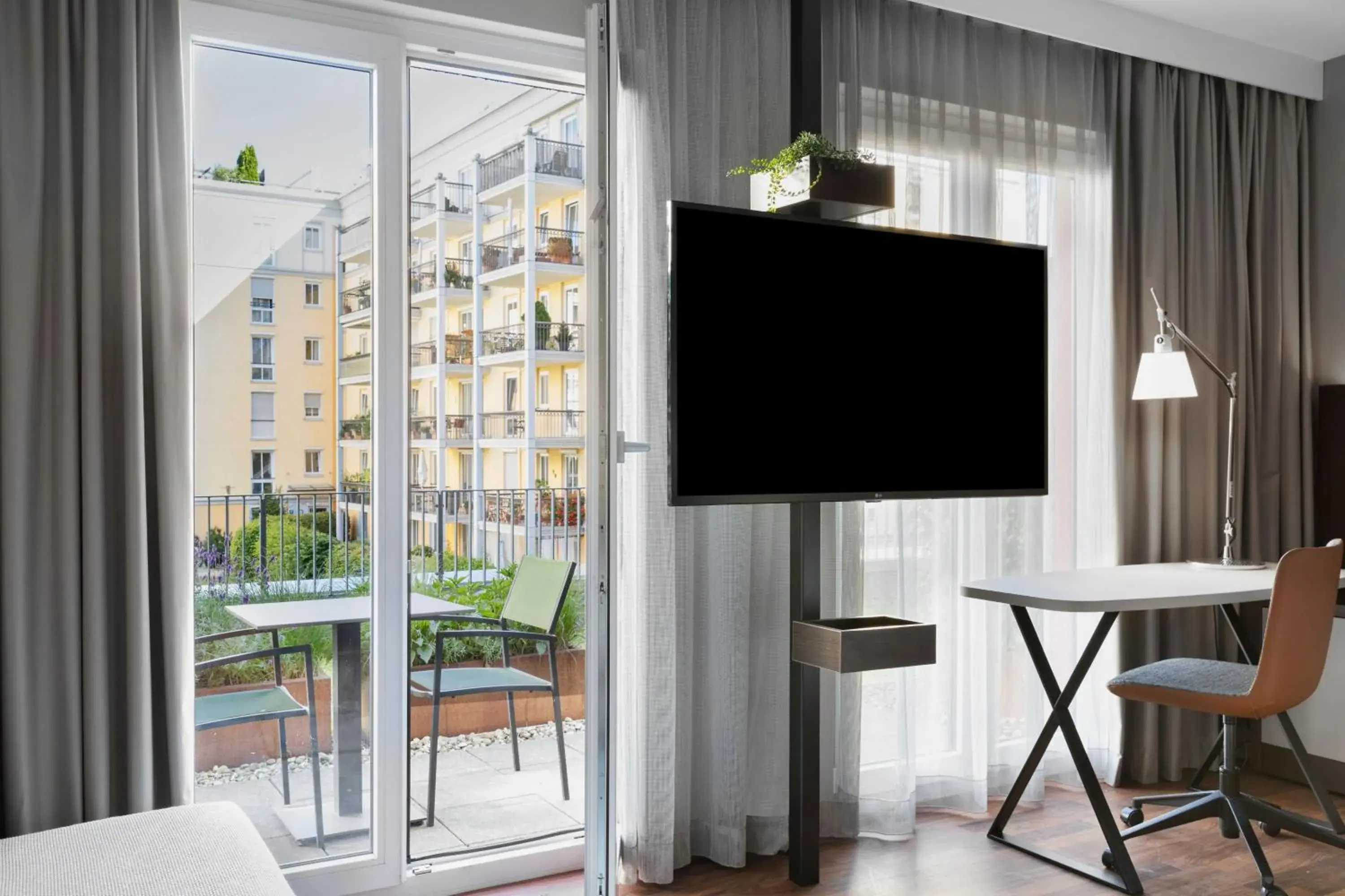 Bedroom, TV/Entertainment Center in Residence Inn by Marriott Munich City East