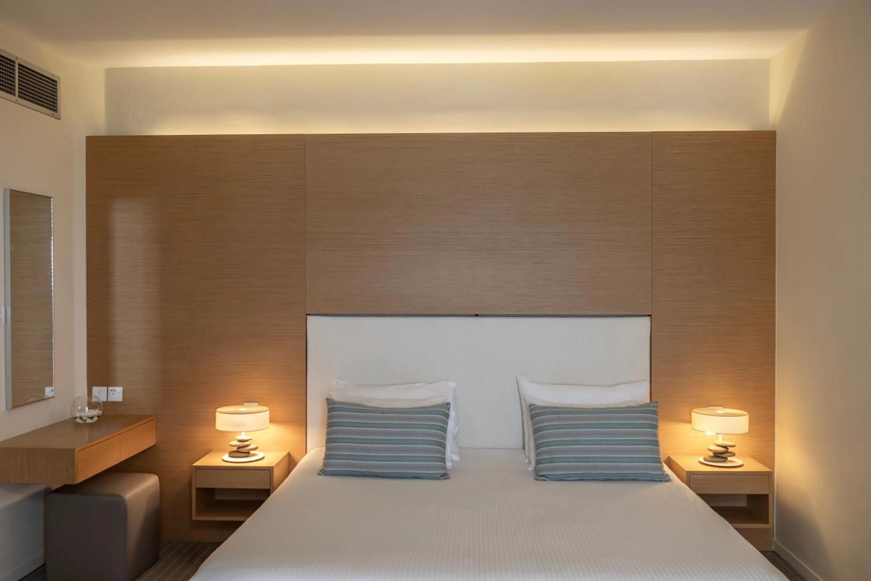 Bed in Capo Bay Hotel