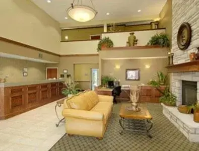 Lobby/Reception in Super 8 by Wyndham Topeka at Forbes Landing