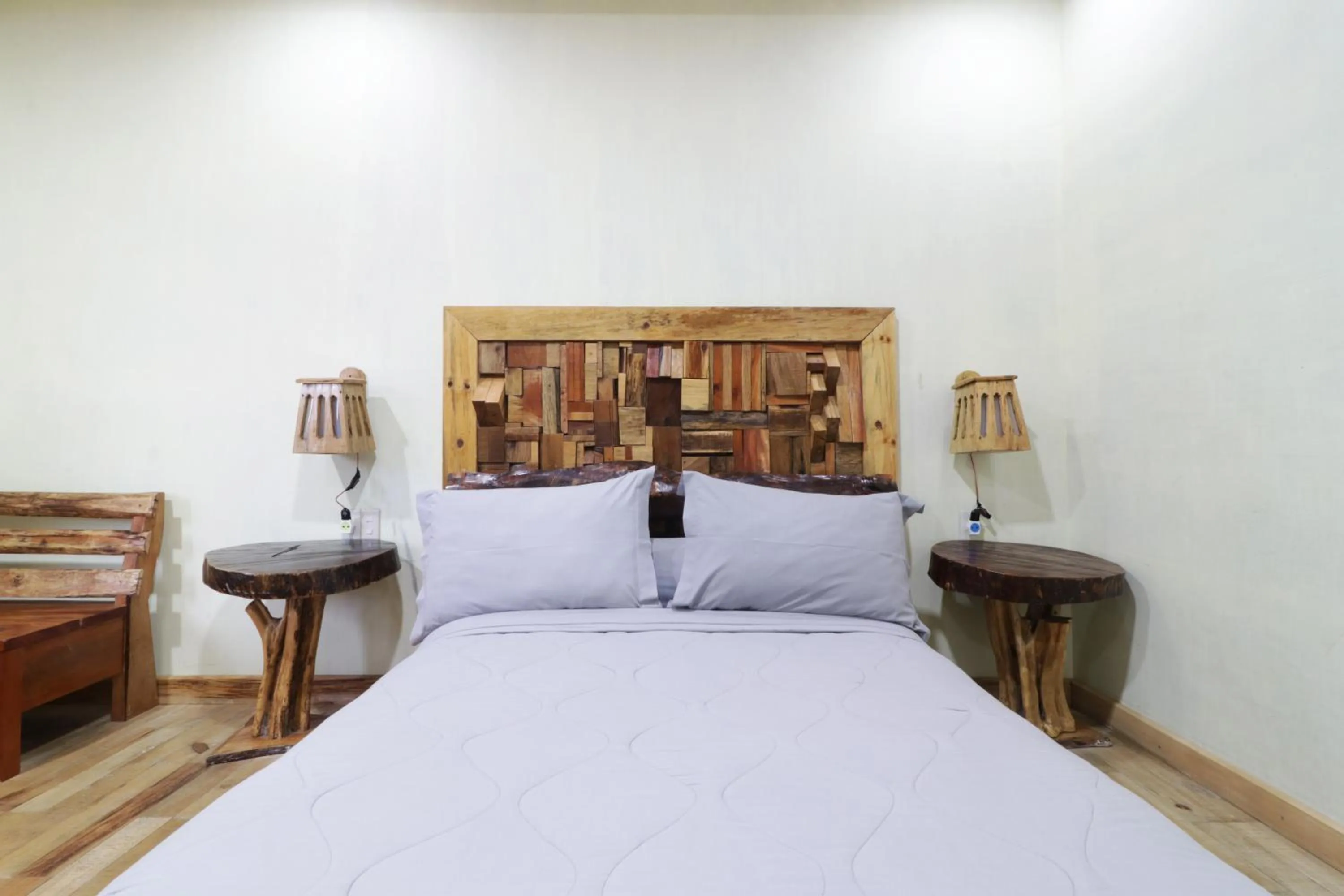 Bed in Alloyna Country Cottage Brastagi