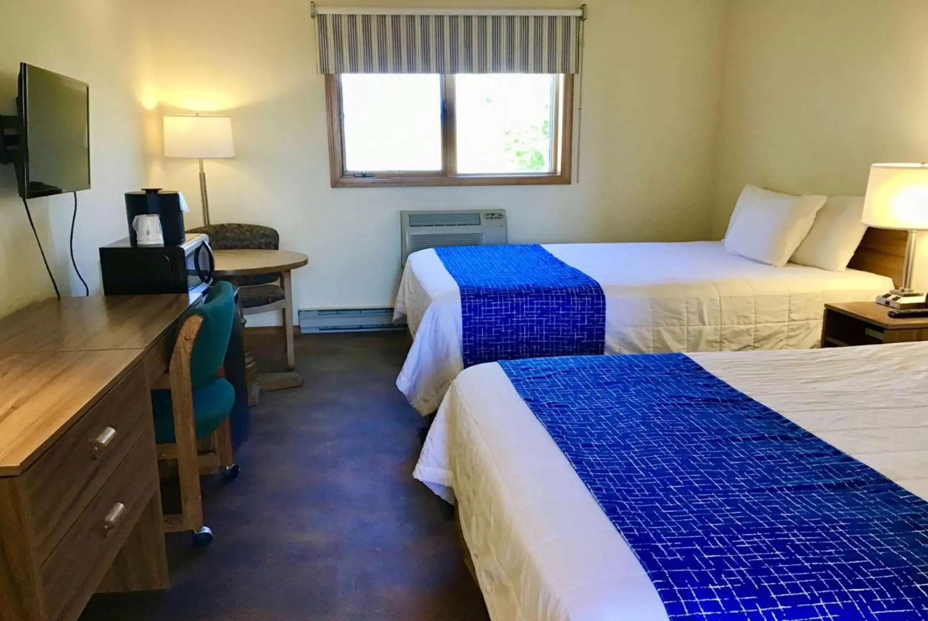 Bed in Travelodge by Wyndham Three Forks
