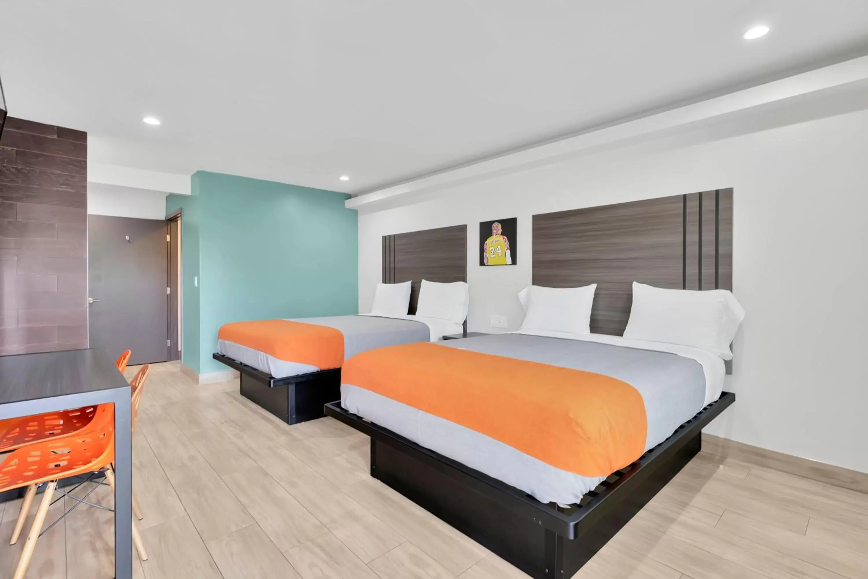 Bed in Exclusivo Inn and Suites
