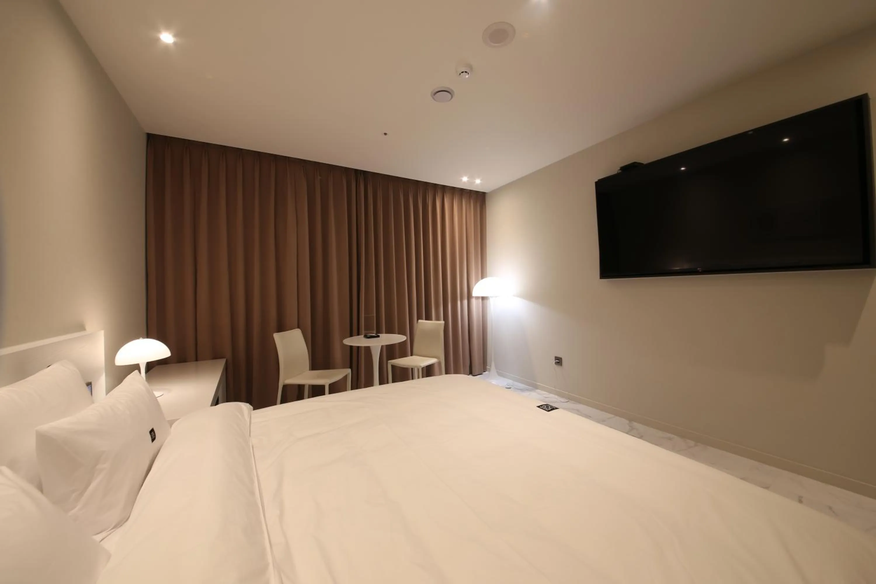 Bed in Zam101 Hotel Gimhae