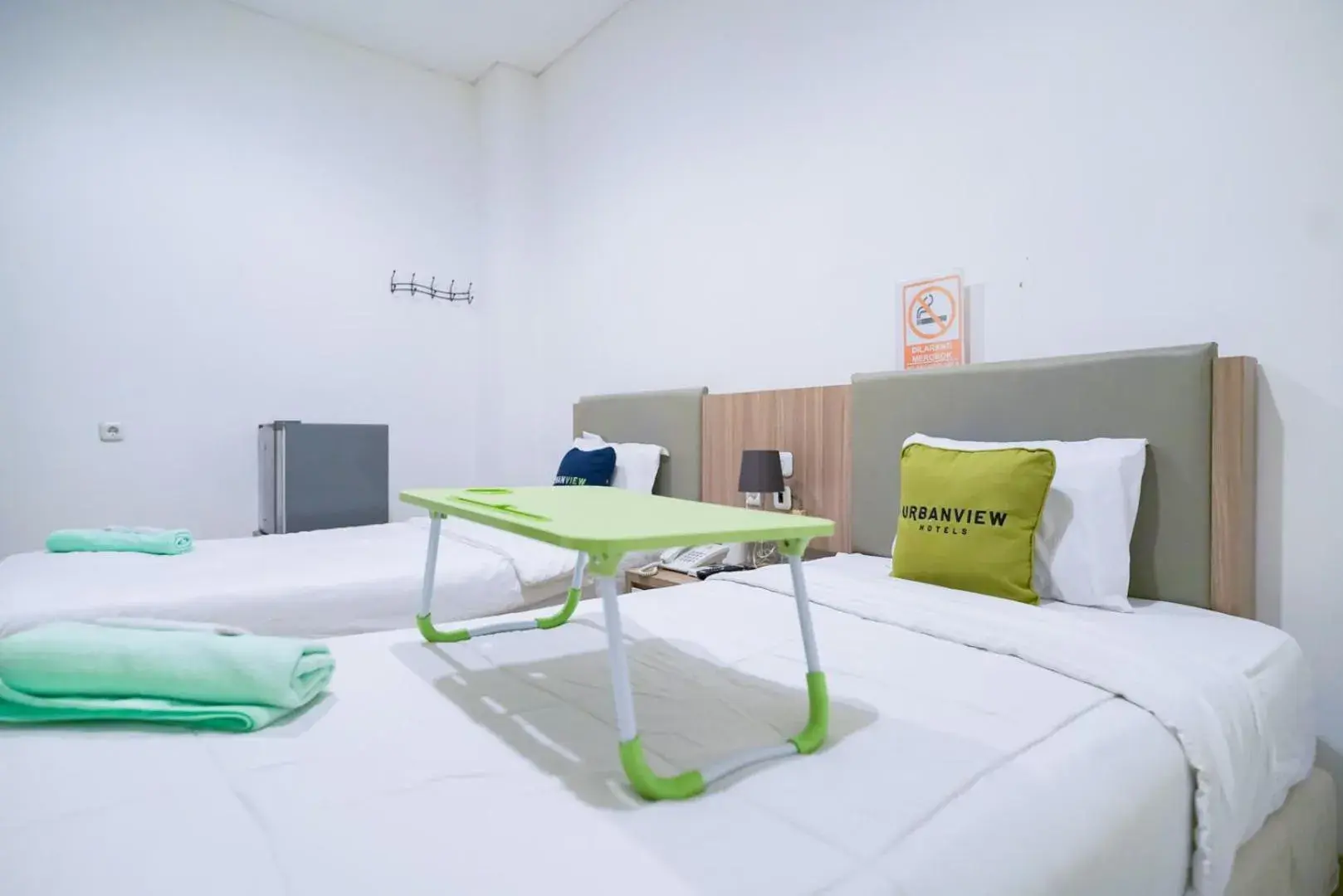 Bedroom, Bed in Urbanview Hotel Bes Mangga Besar