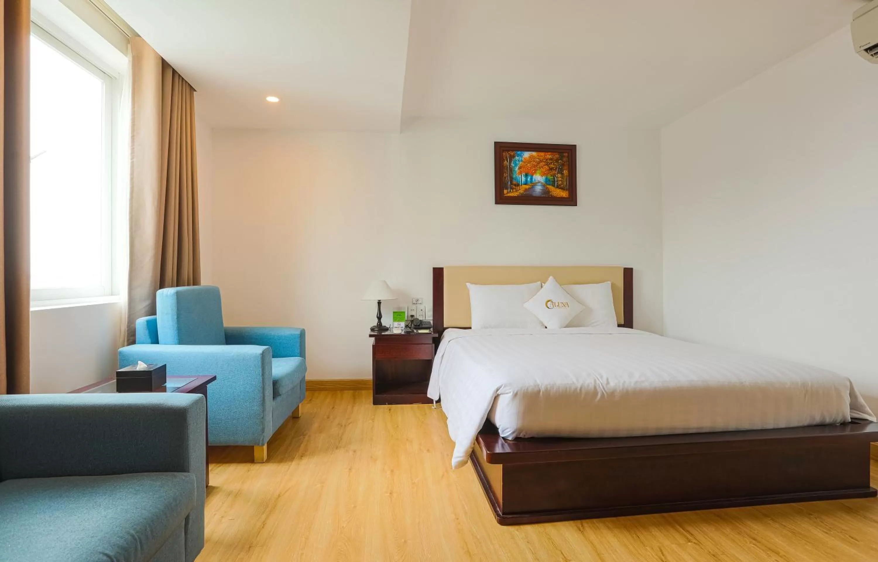 Bed in ALUNA Ben Thanh Hotel